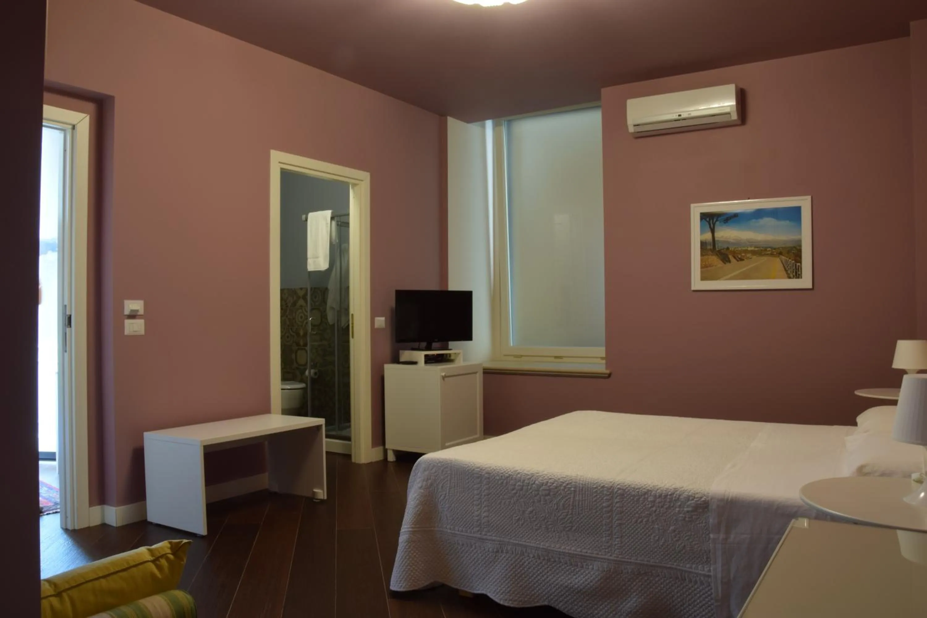 Photo of the whole room, Bed in Residenza Cavour