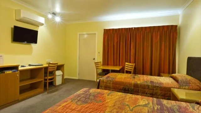 Bed in Motel Le Grande