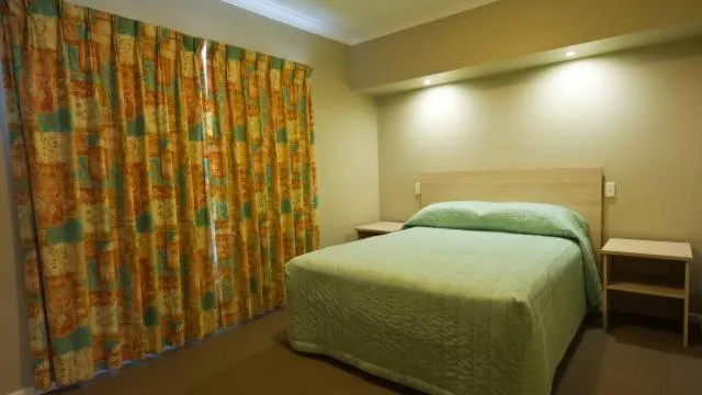 Bed in Motel Le Grande