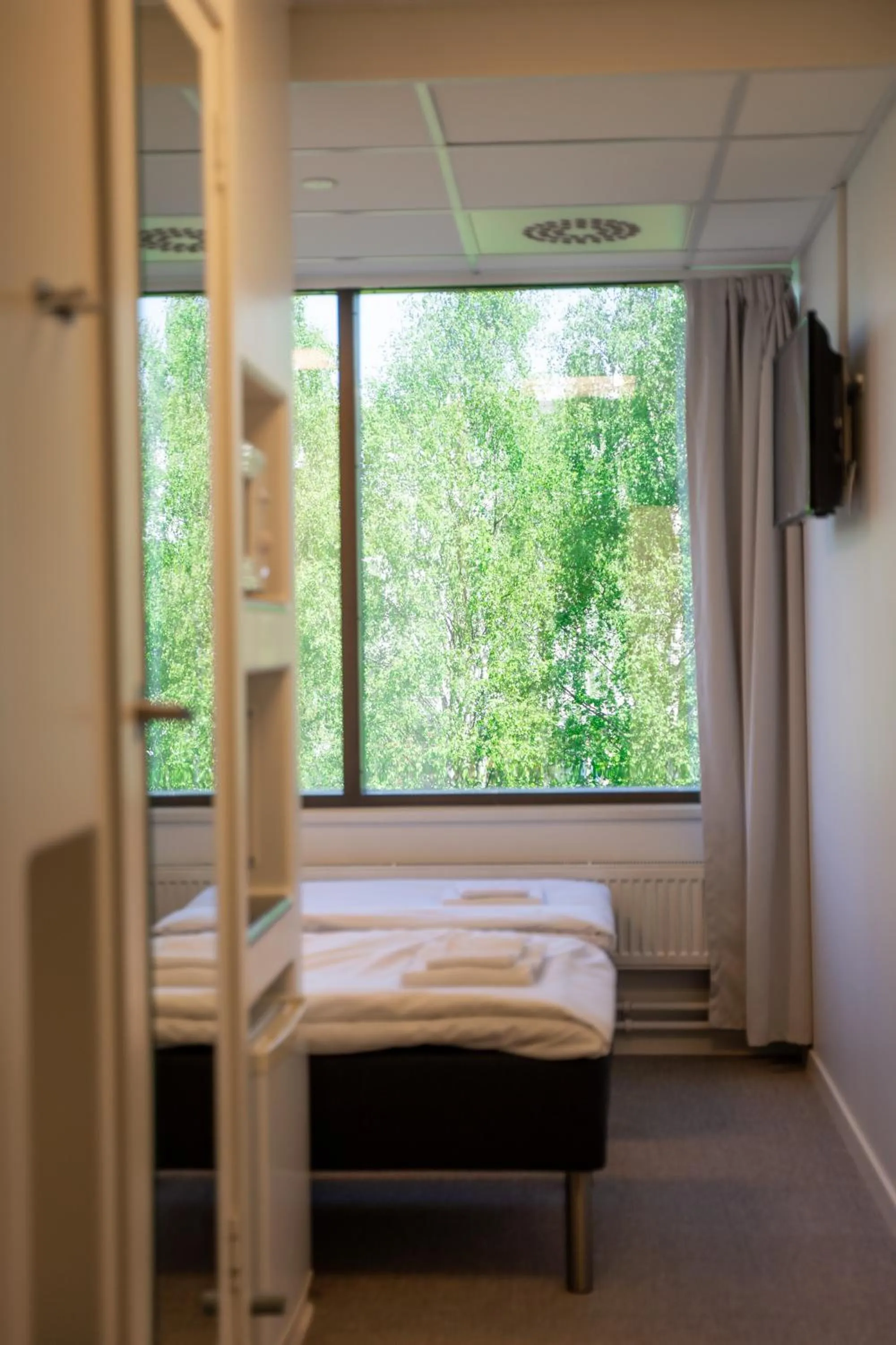 Bed in GreenStar Hotel Oulu