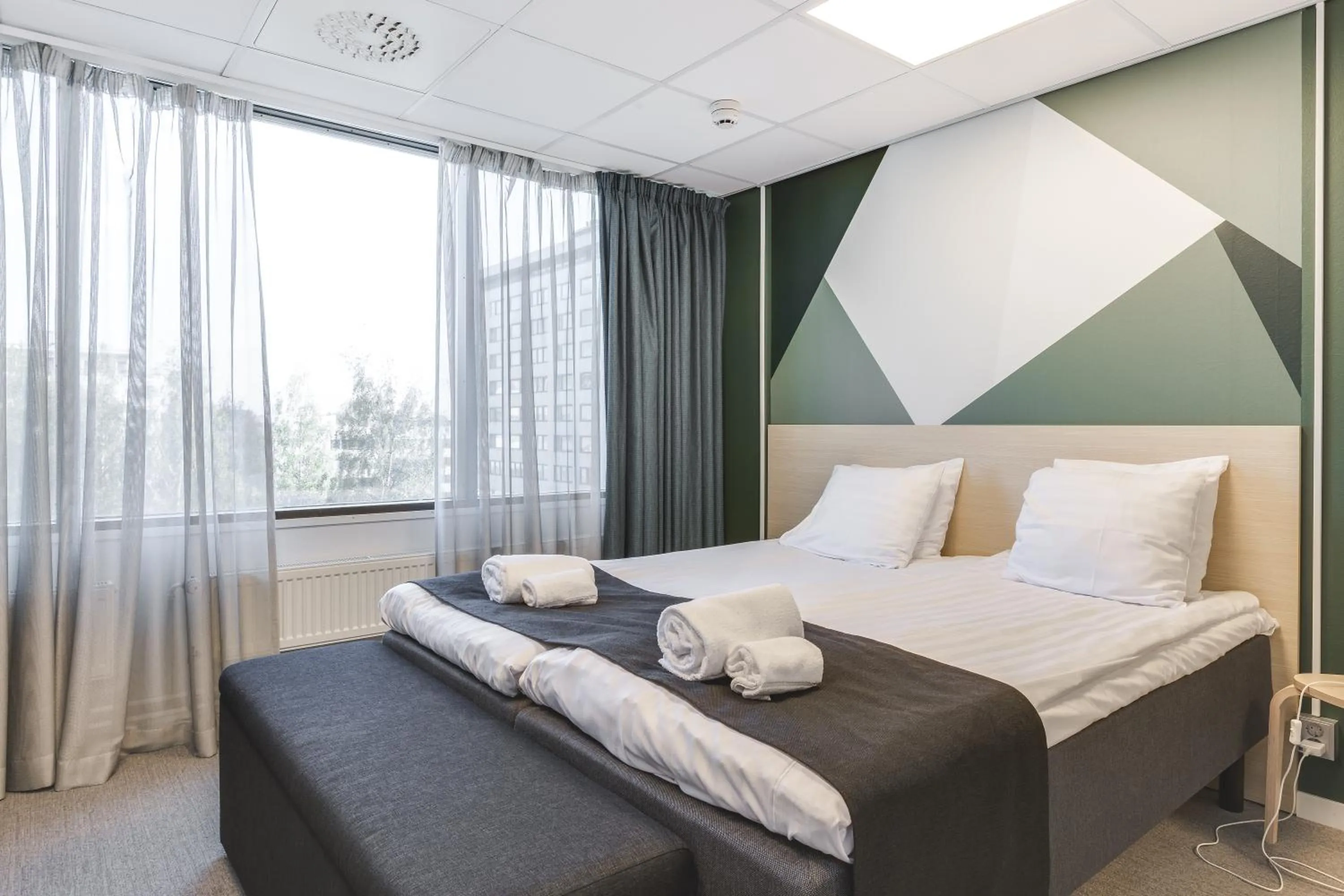 Bed in GreenStar Hotel Oulu