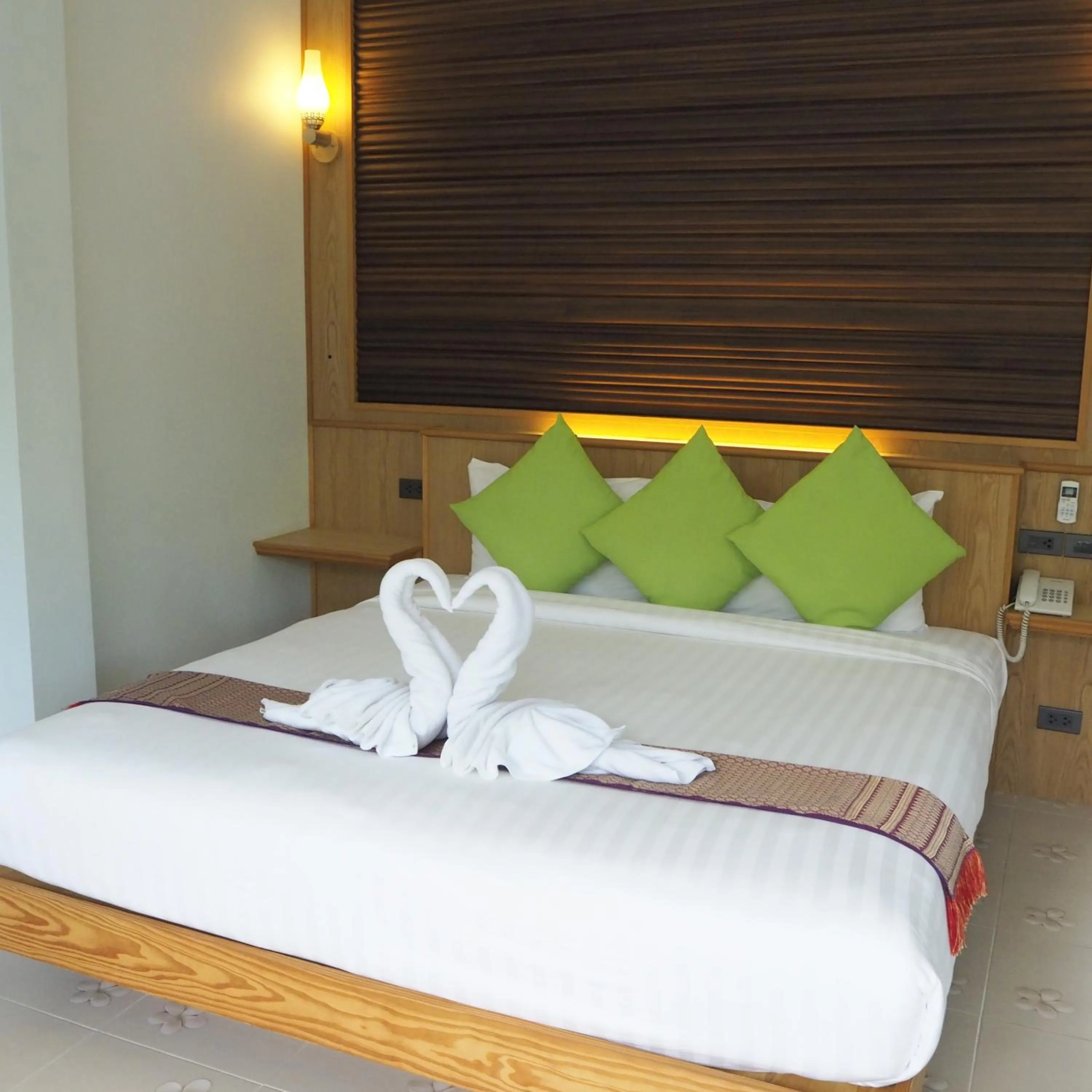 Bed in Jasmine Resort And Spa