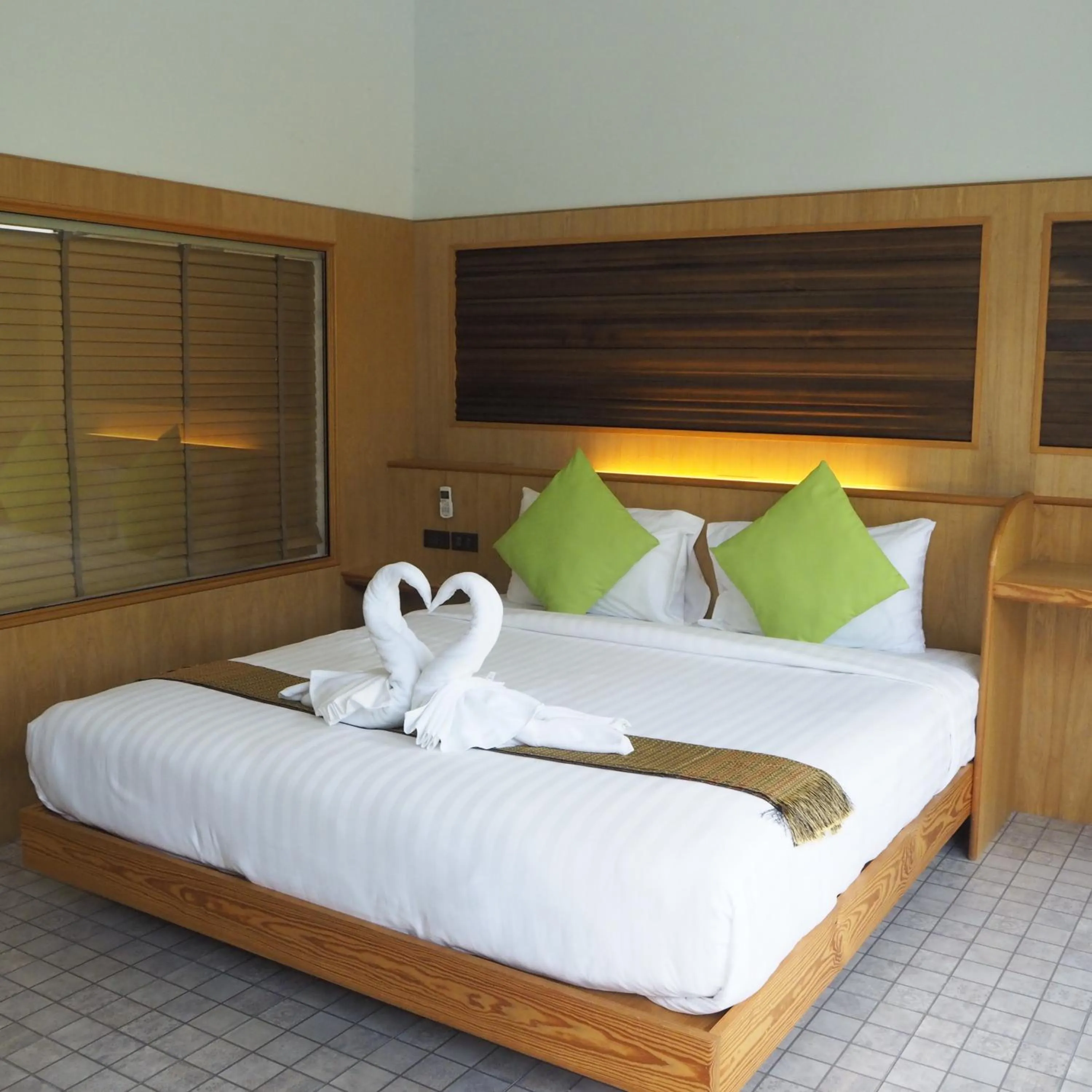 Bed in Jasmine Resort And Spa