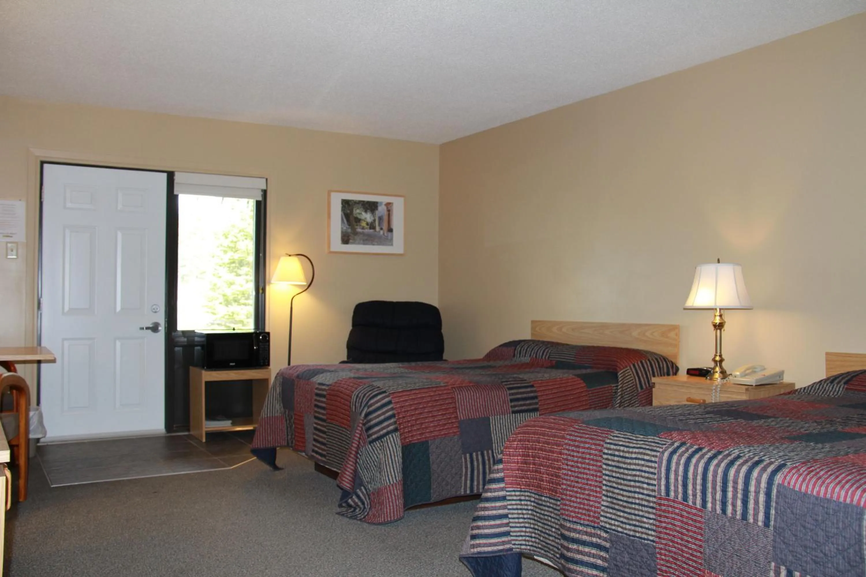 Bed in Motel Alexandrin