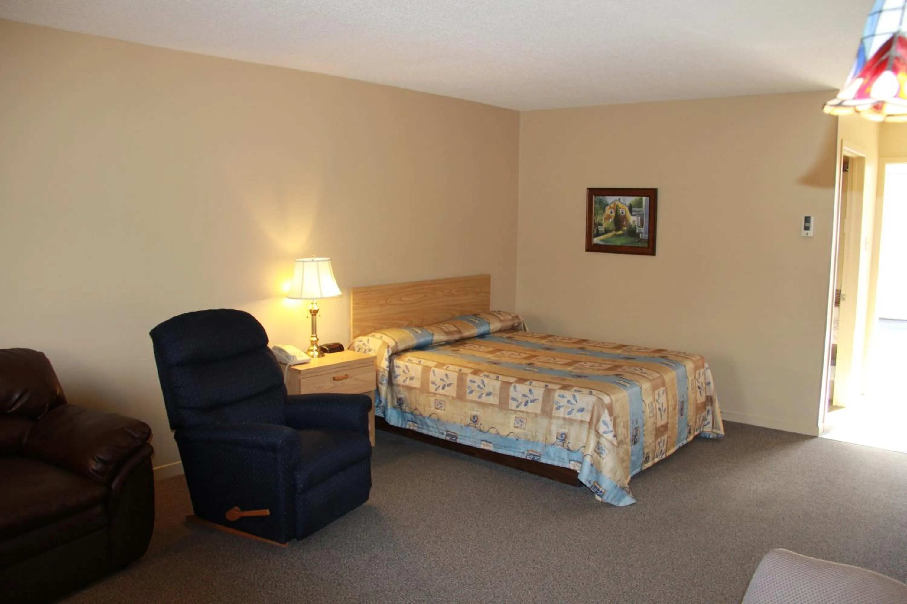 Bed in Motel Alexandrin