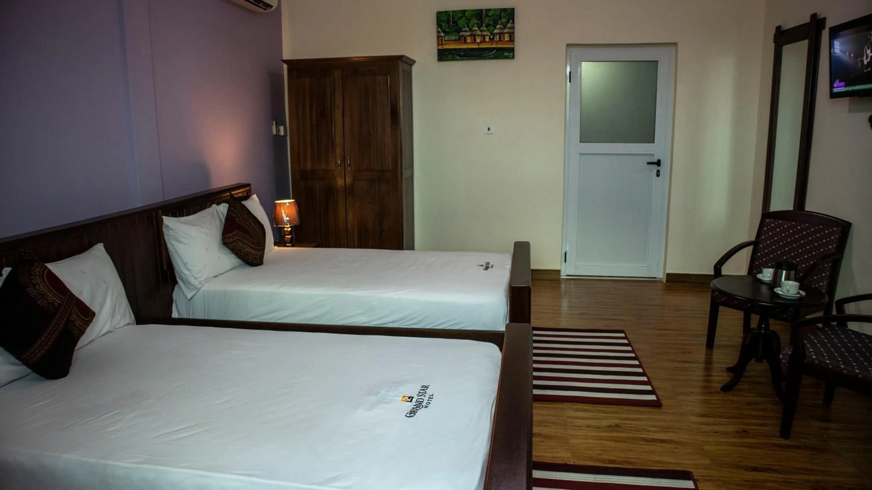 Bedroom, Bed in Grand Star Hotel