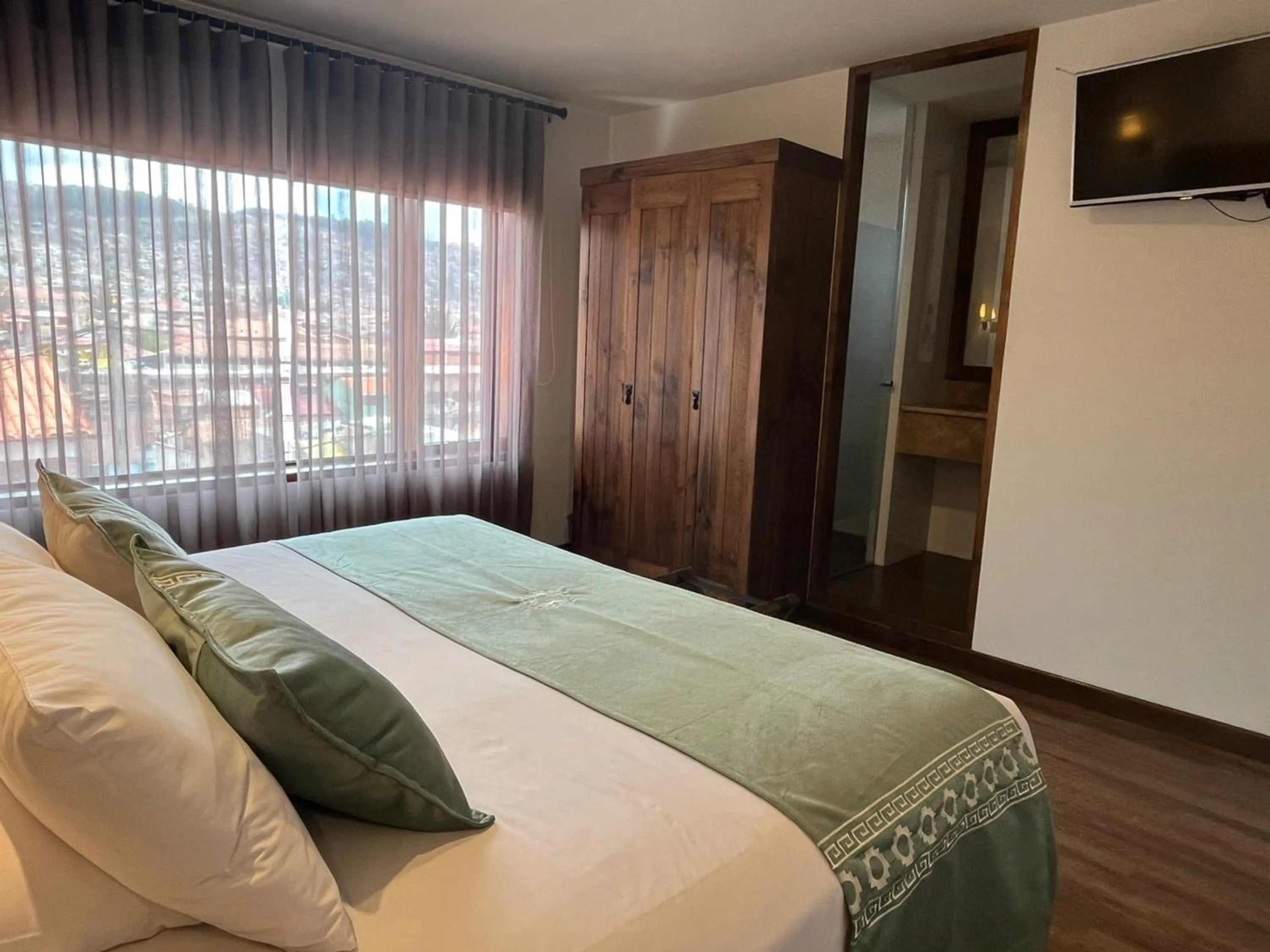 Bed in Casa Esmeralda by Katari