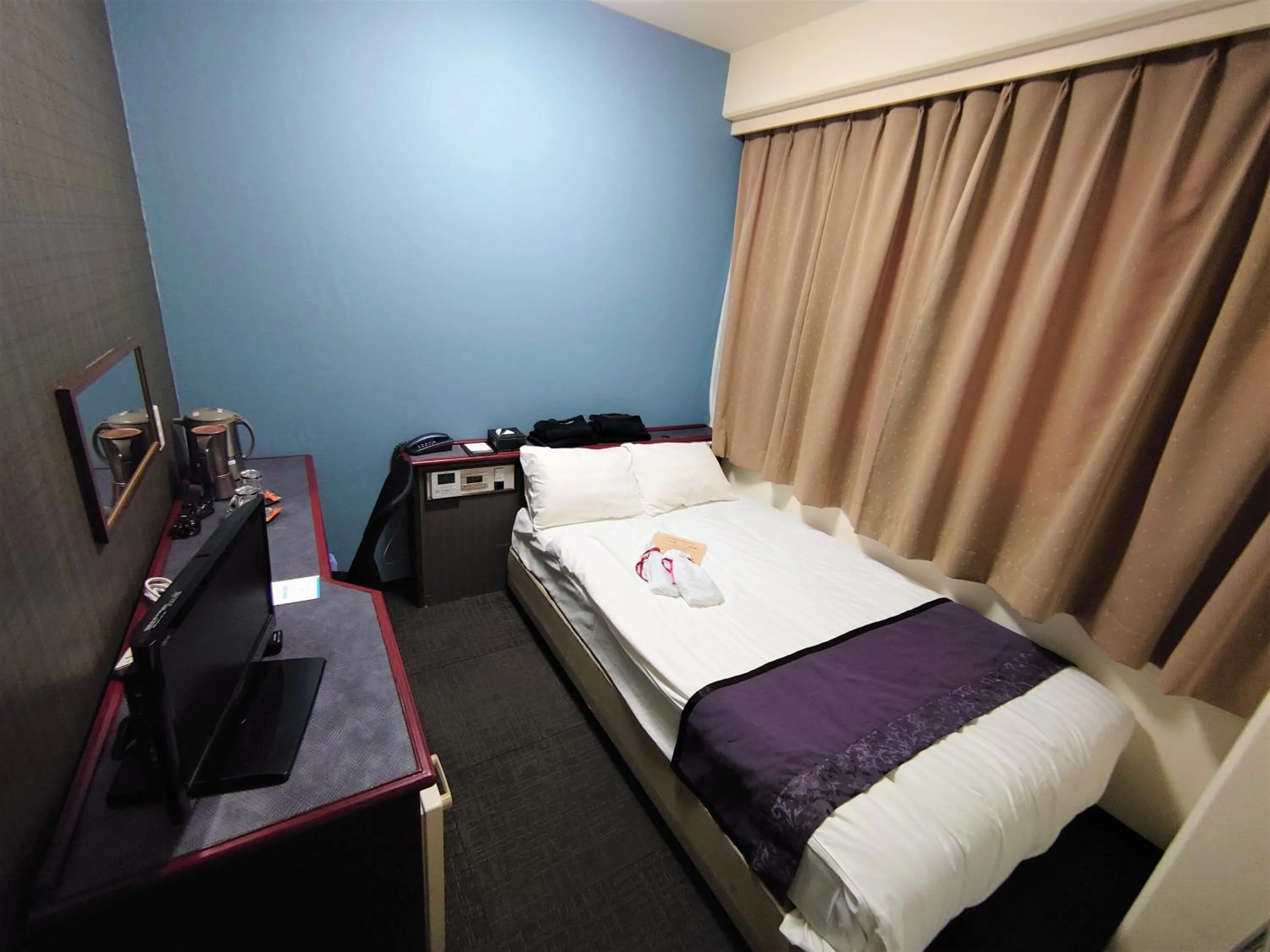 Bed in Hotel Area One Oita