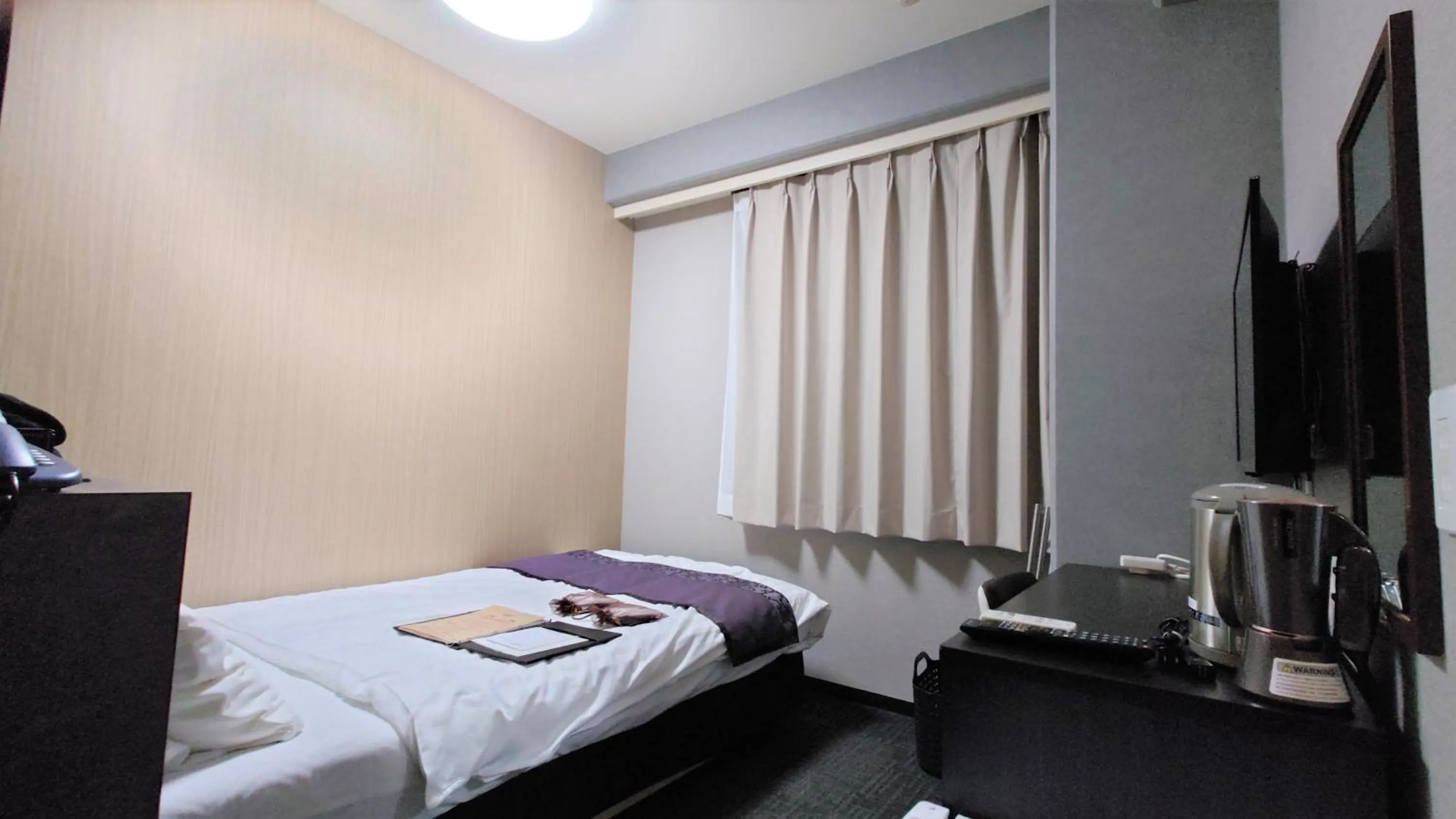 Bed in Hotel Area One Oita