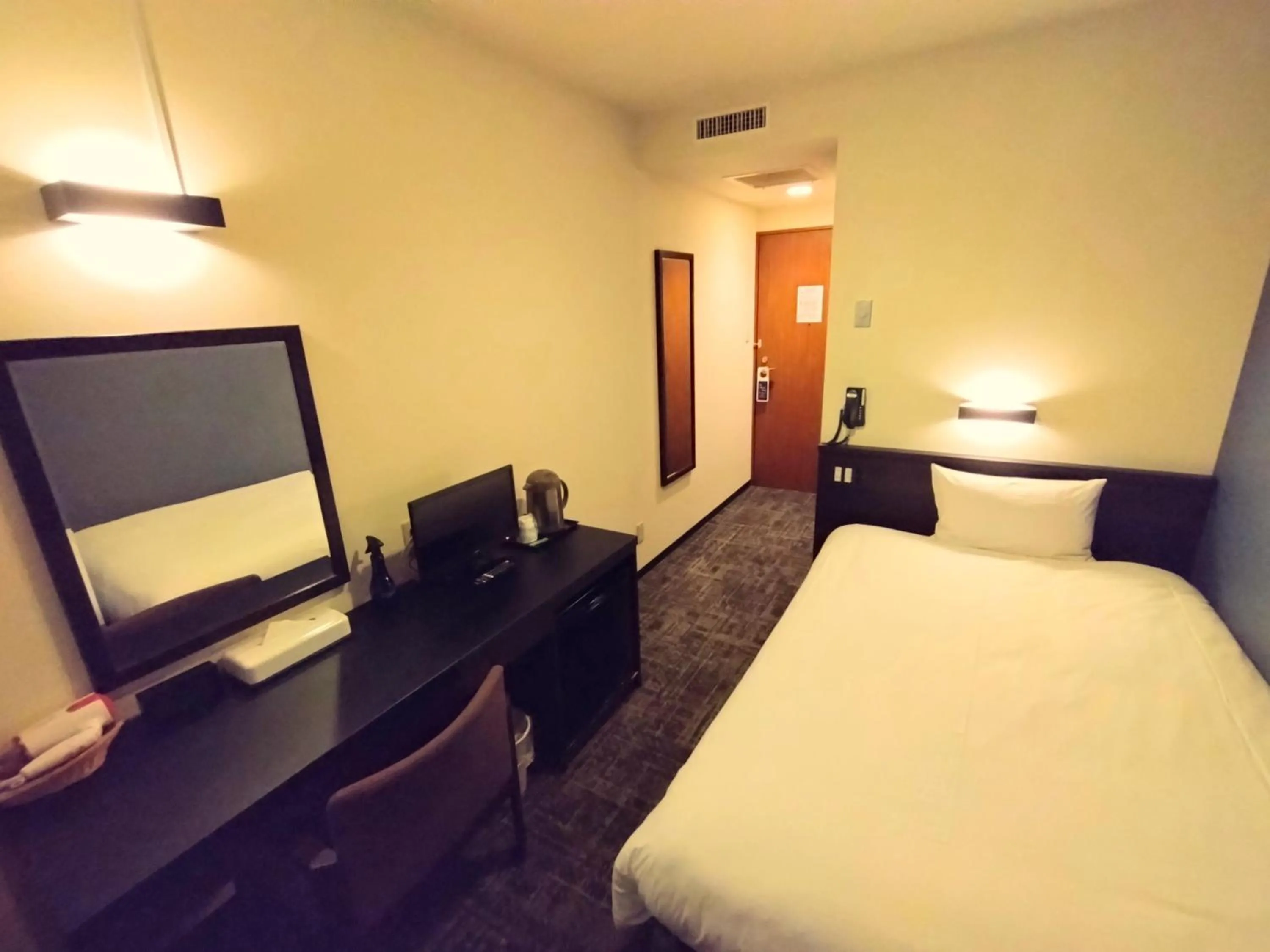 Bed in Hotel Bougain Villea Sapporo