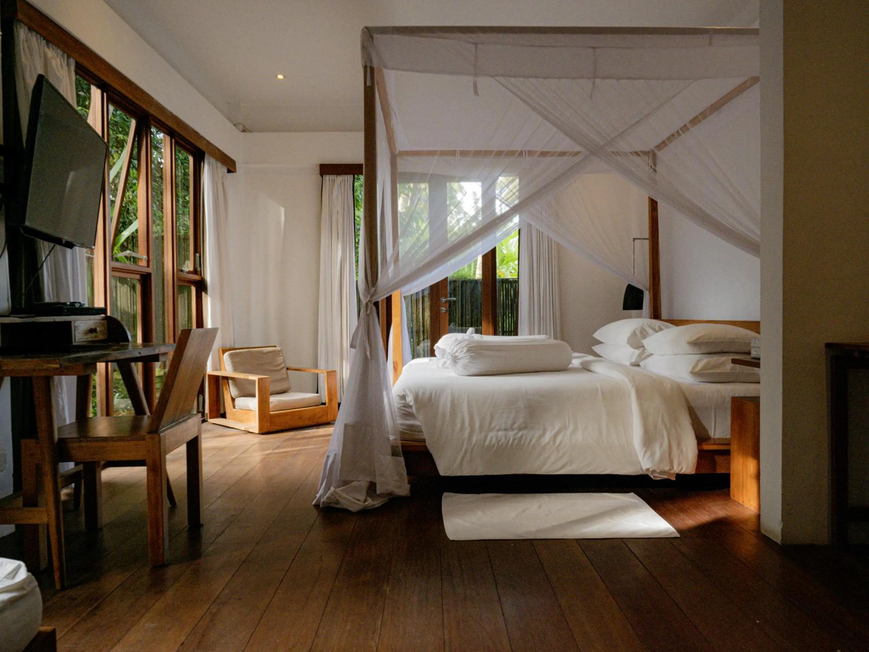 Bed in De Ubud Villas & Spa
