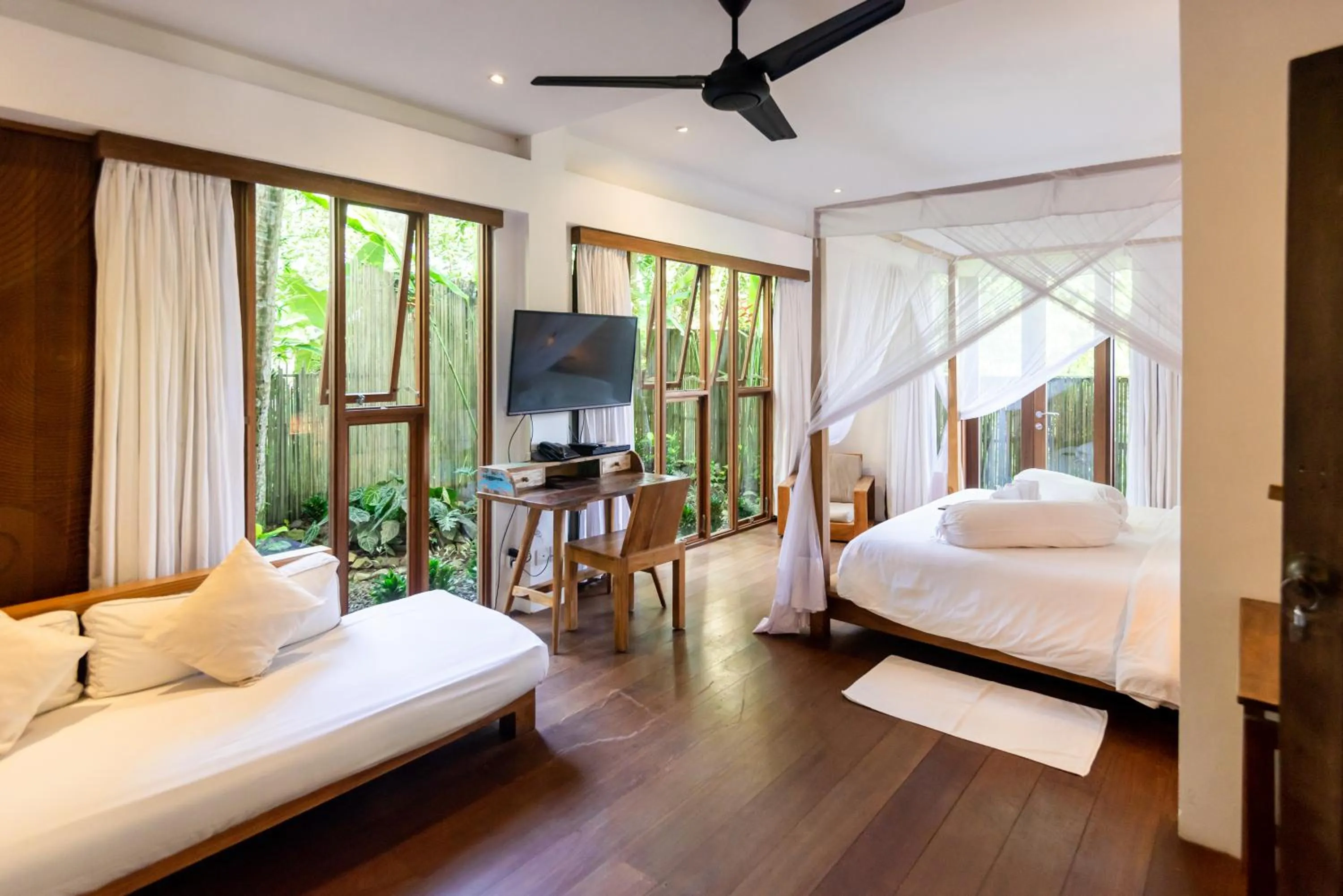 Bed in De Ubud Villas & Spa