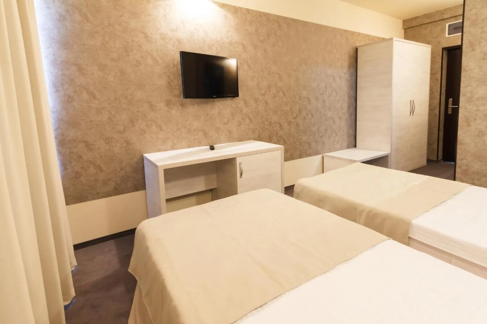 Bed in YMY HOTELS Târgu Jiu