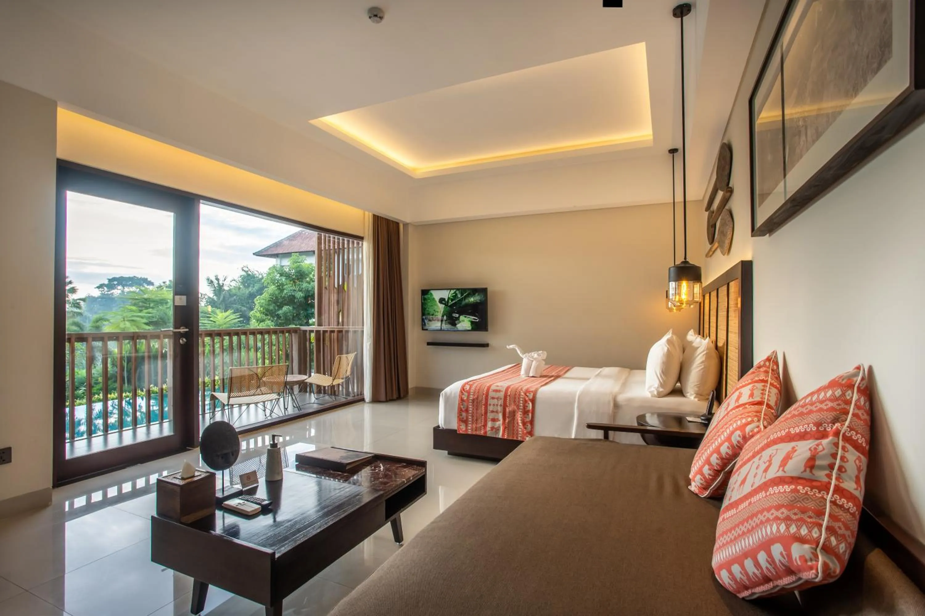 Bed in Sanctoo Suites & Villas