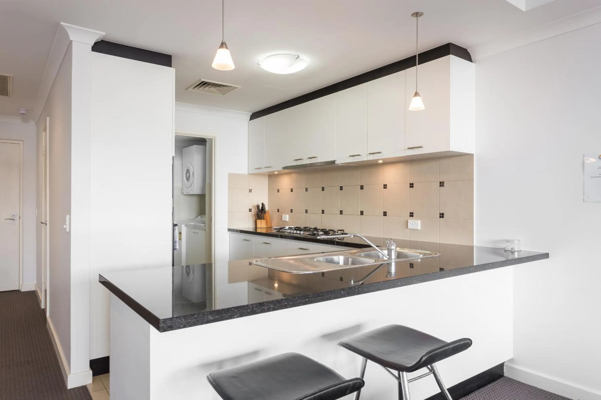 Kitchen or kitchenette in Nautilus by Rockingham Apartments