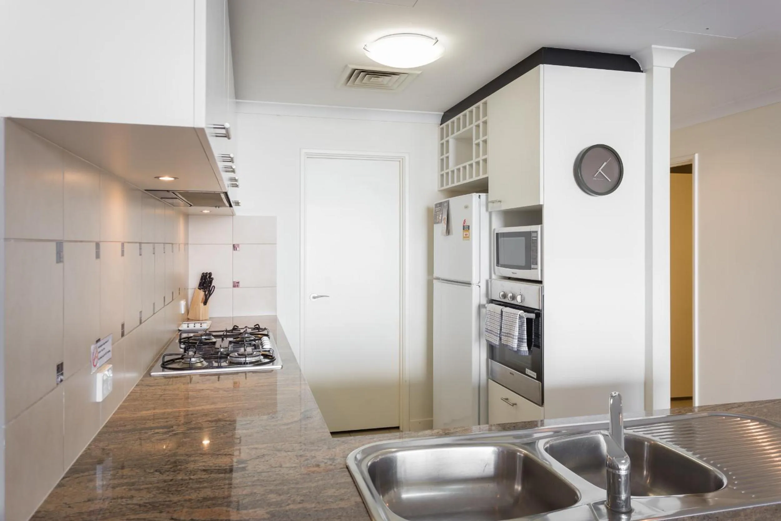 Kitchen or kitchenette in Nautilus by Rockingham Apartments
