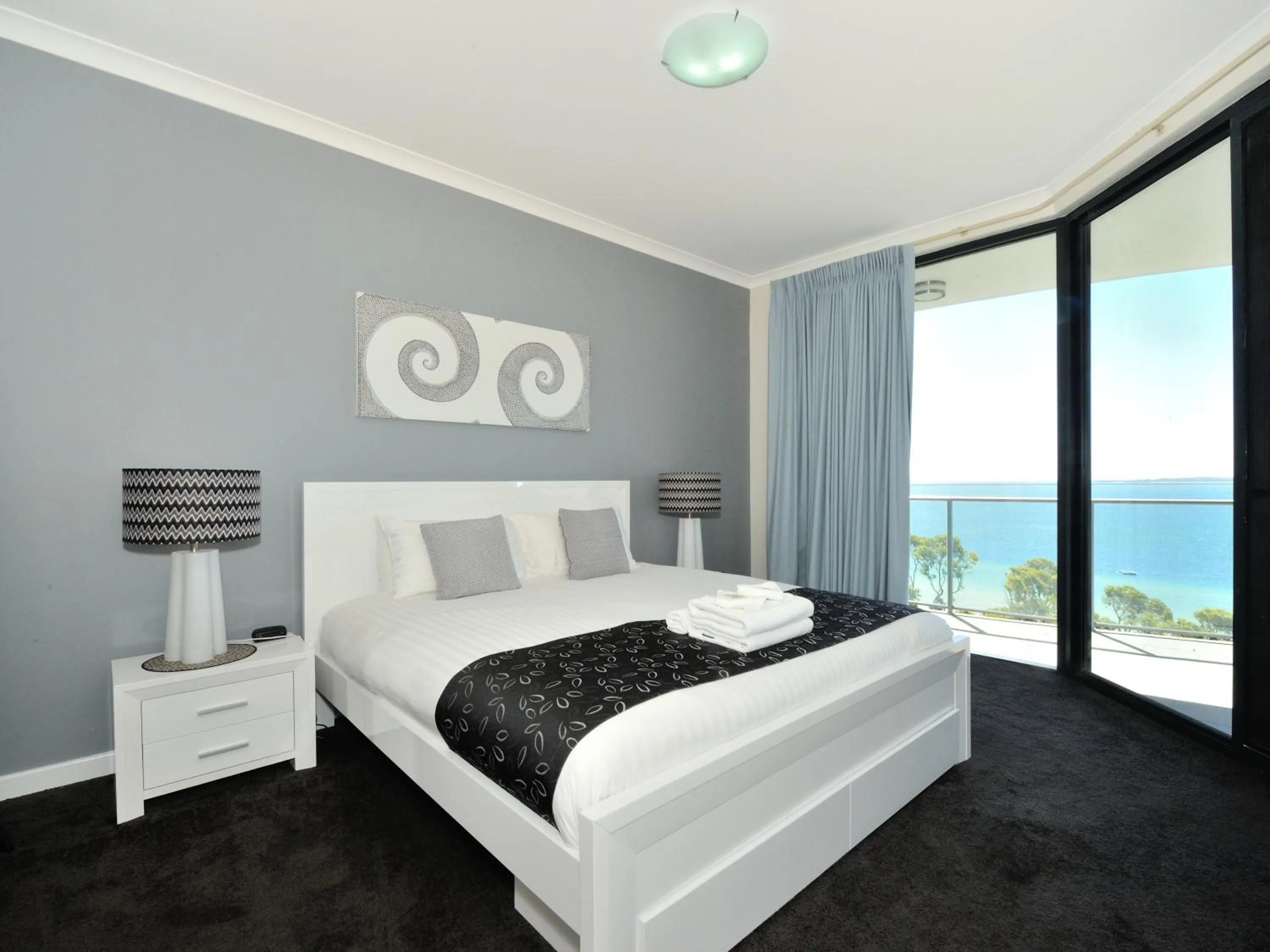 Bed in Nautilus by Rockingham Apartments