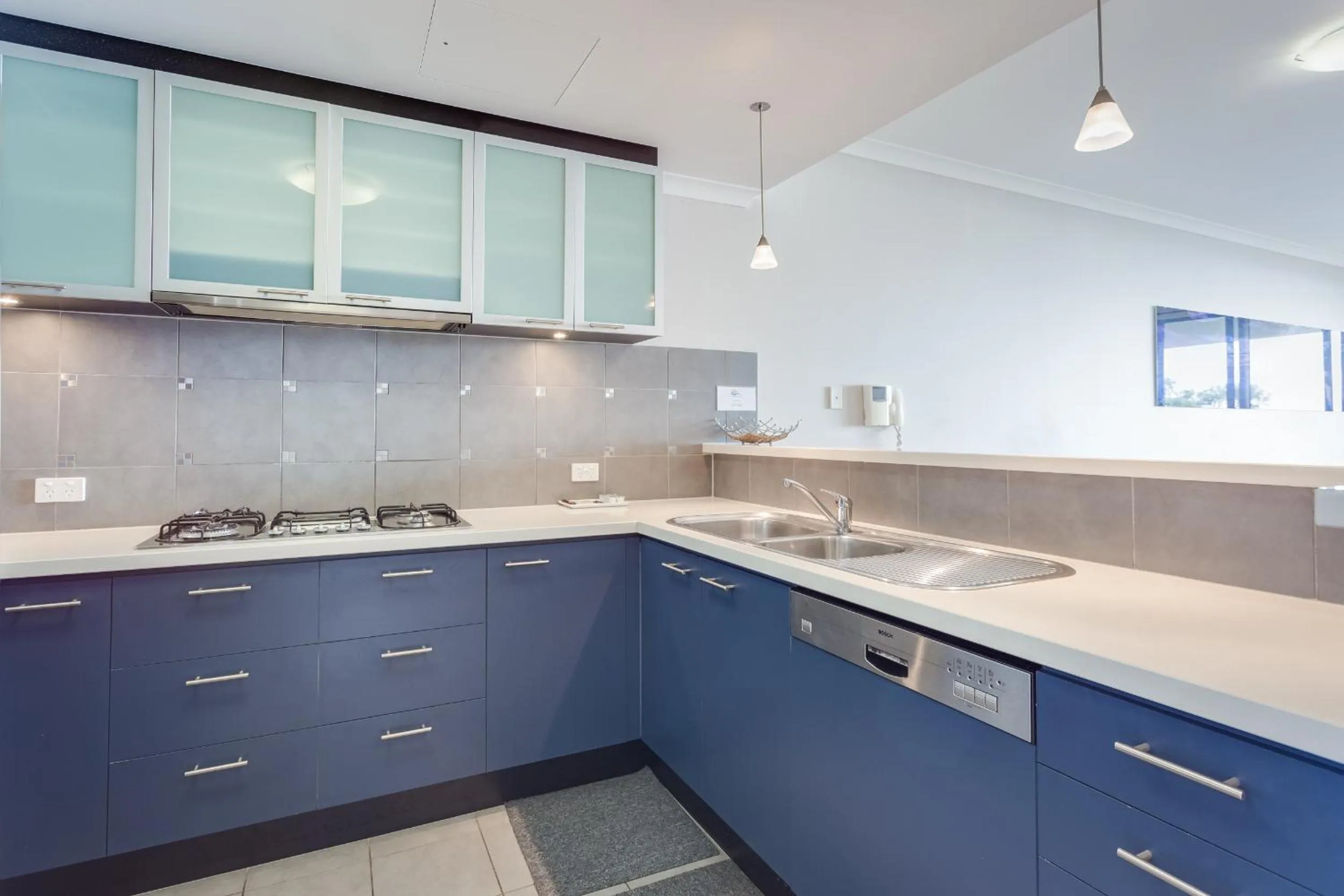 Kitchen or kitchenette in Nautilus by Rockingham Apartments