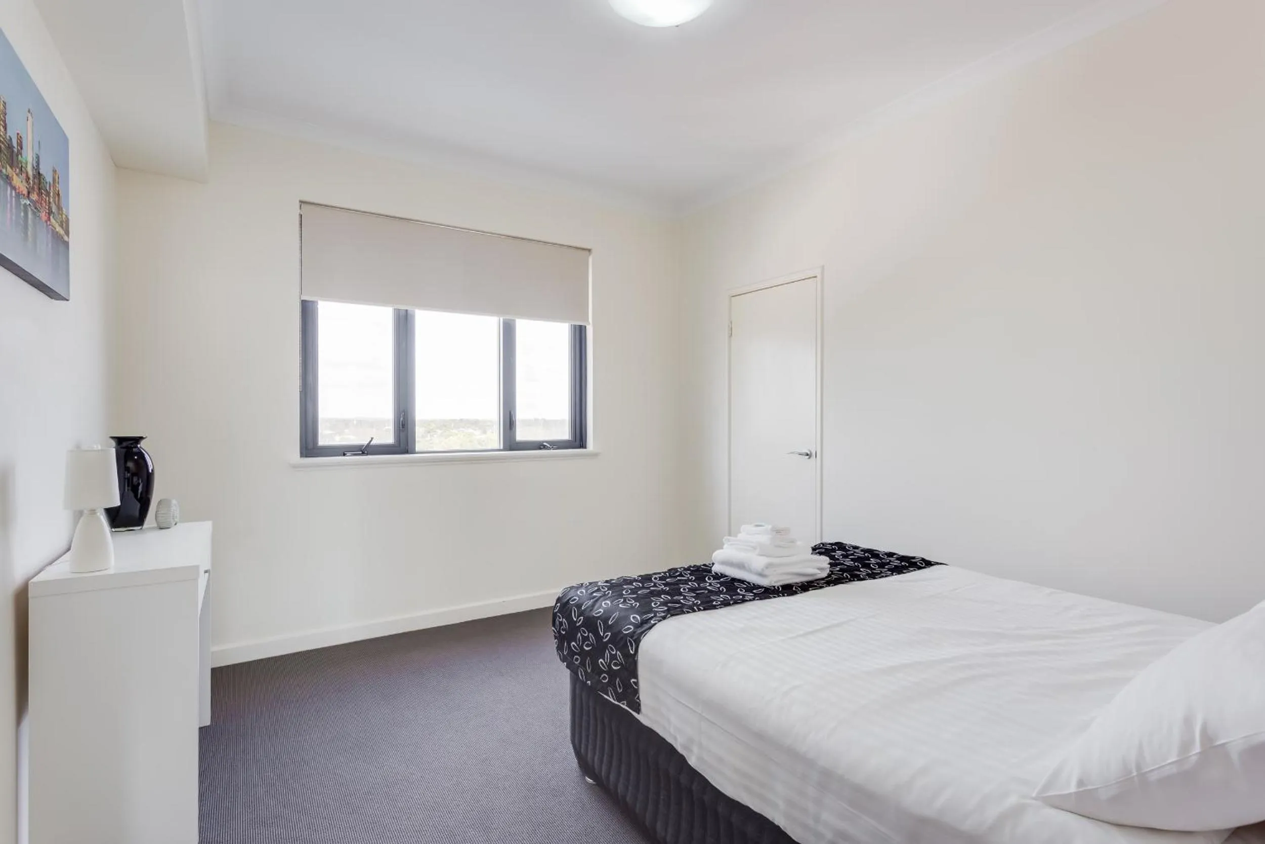 Day, Bed in Nautilus by Rockingham Apartments