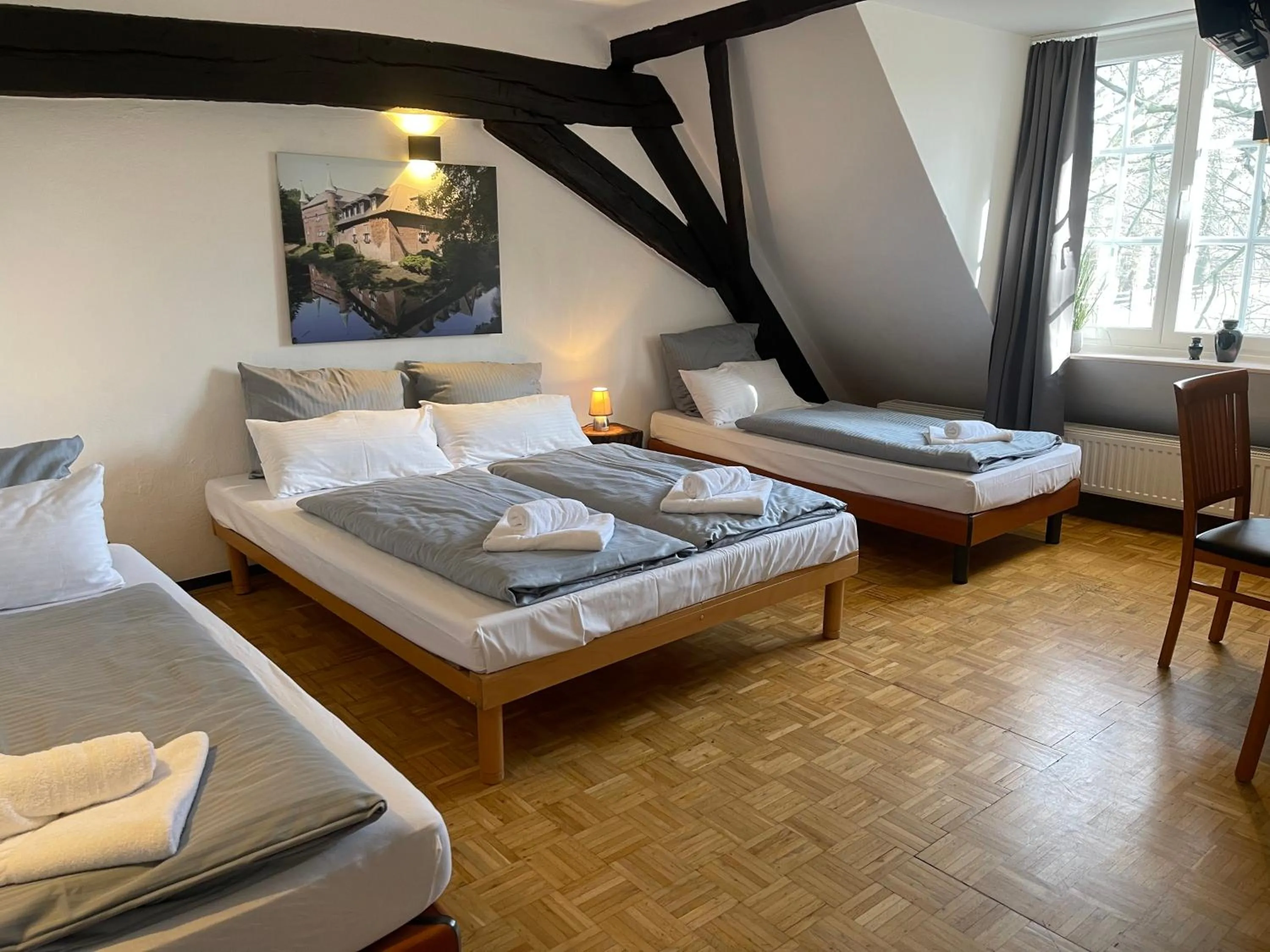Photo of the whole room, Bed in Hotel Schloss Walbeck