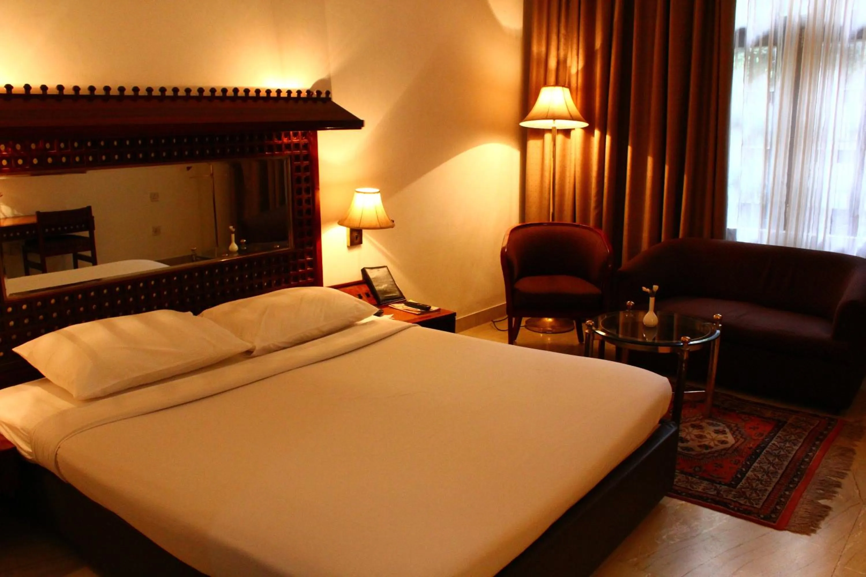 Photo of the whole room, Bed in Ashok Country Resort