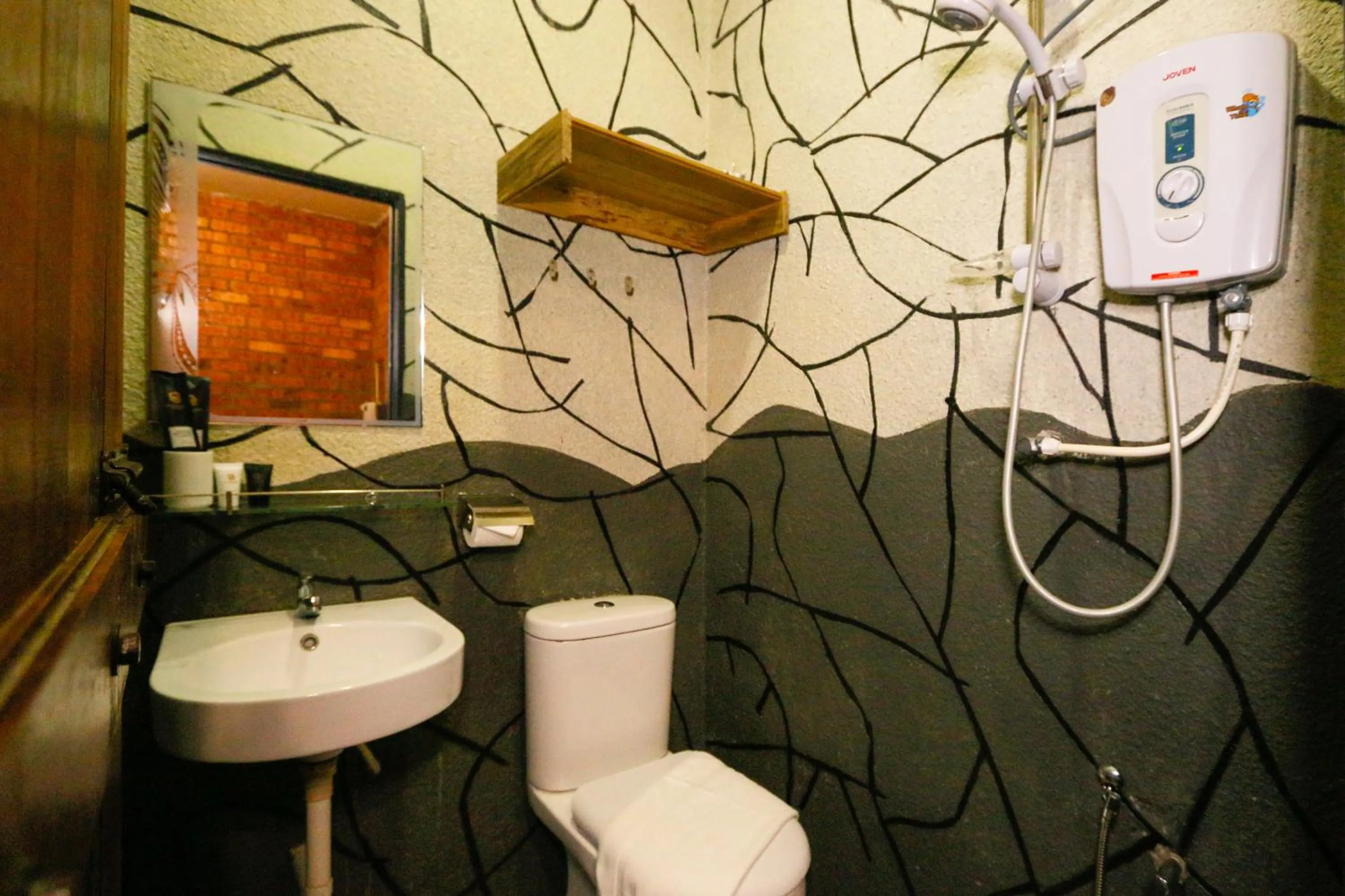 Toilet in Anggun Hotel