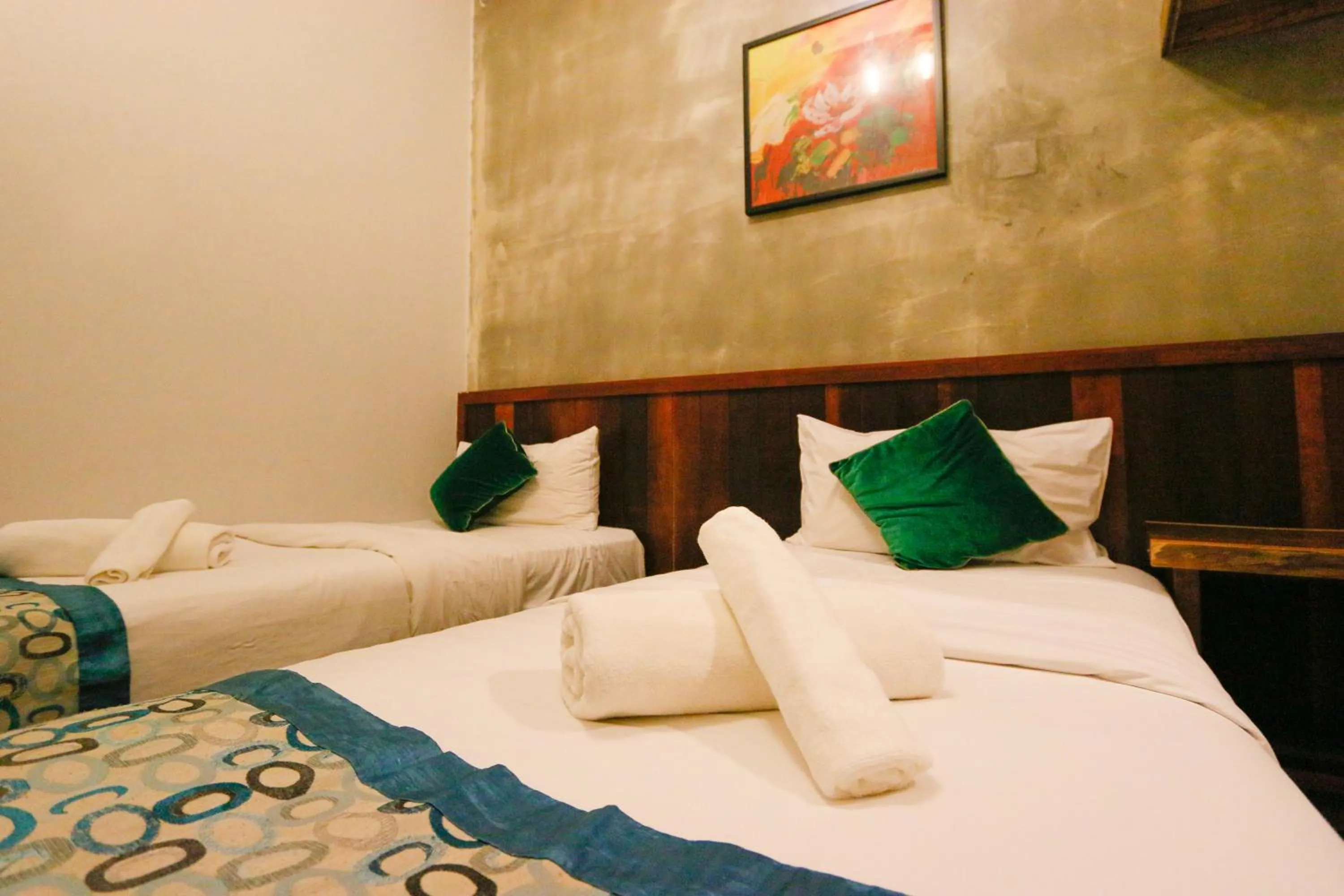 Bed in Anggun Hotel