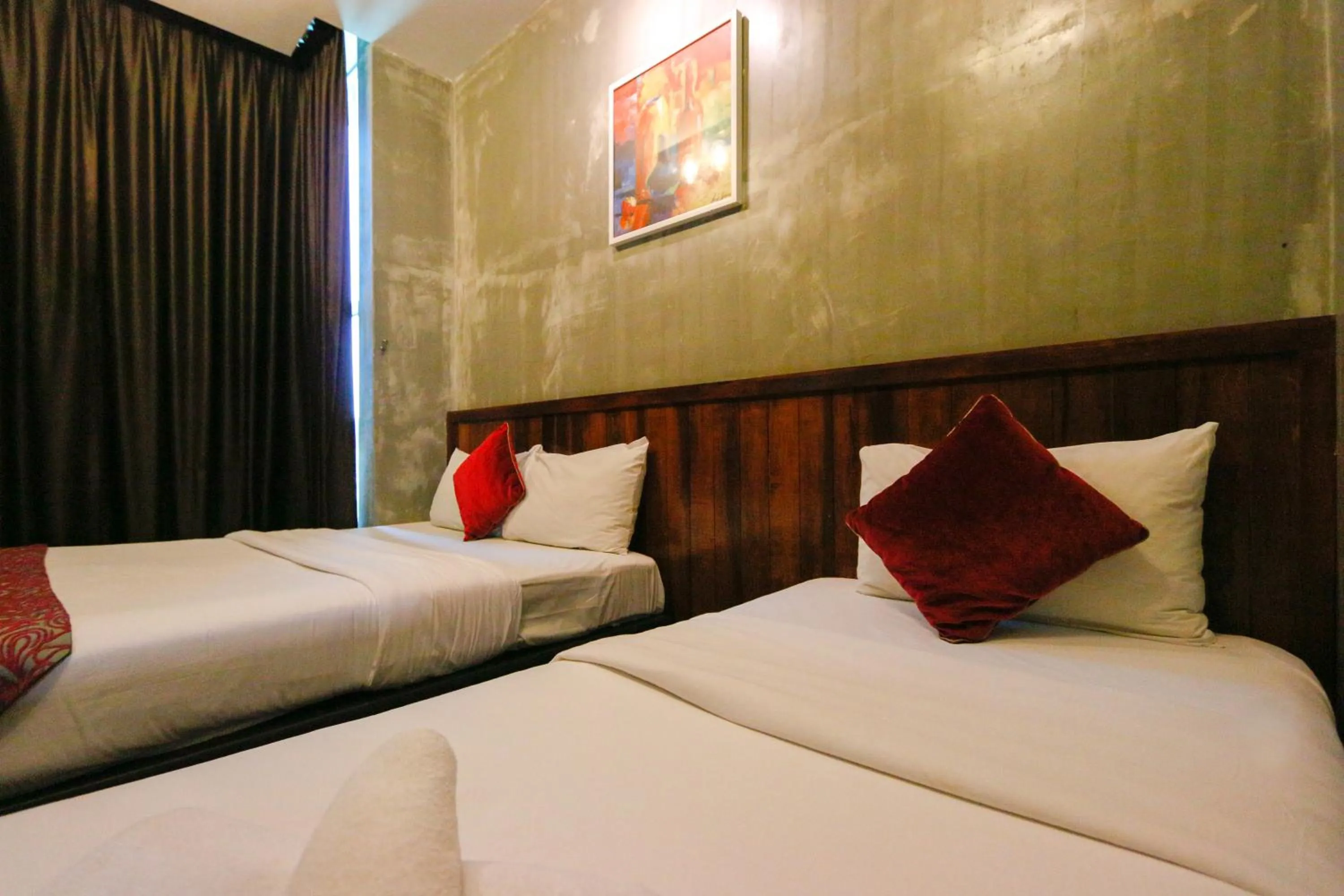 Bed in Anggun Hotel