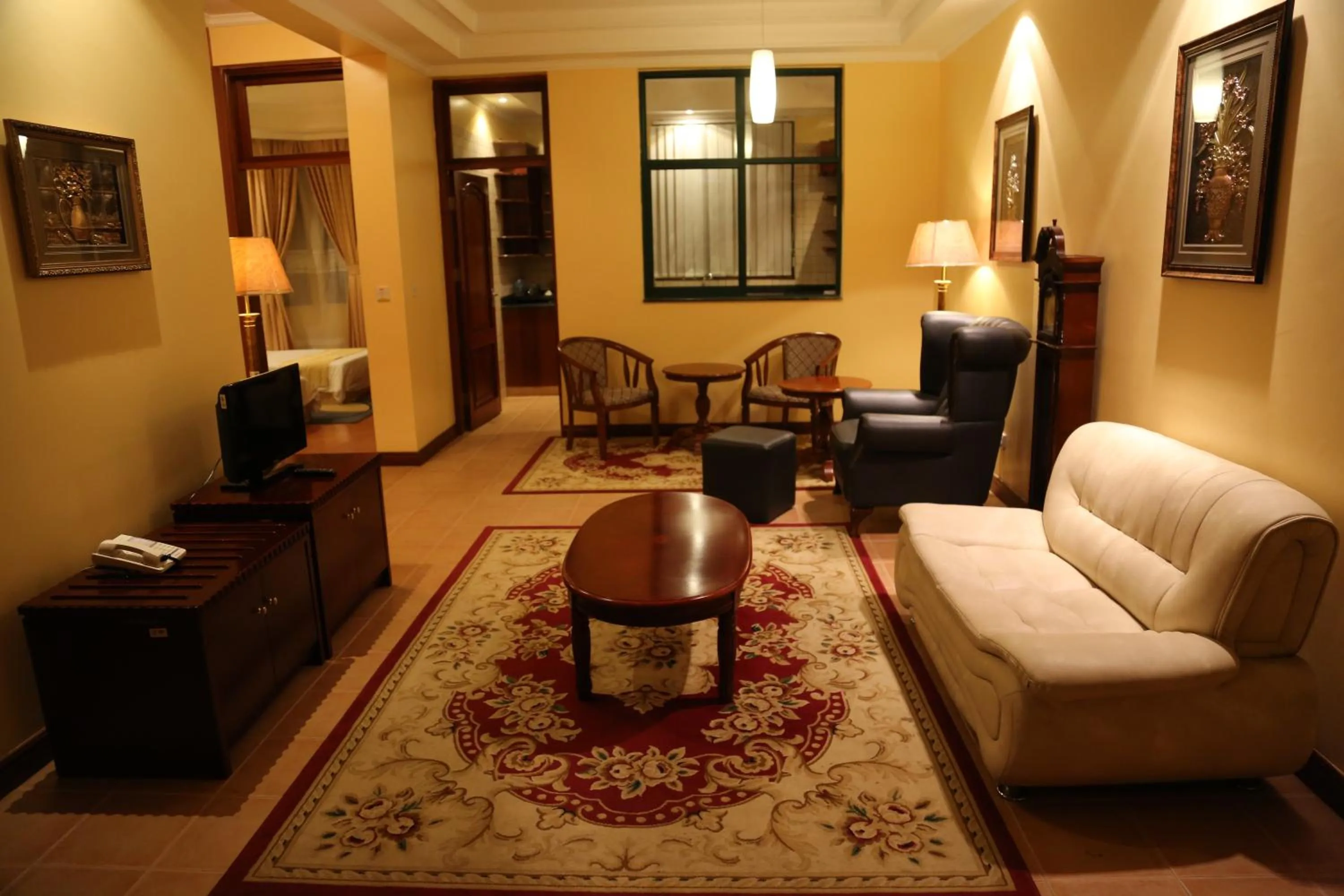 Photo of the whole room in Gold Crest Hotel - Arusha
