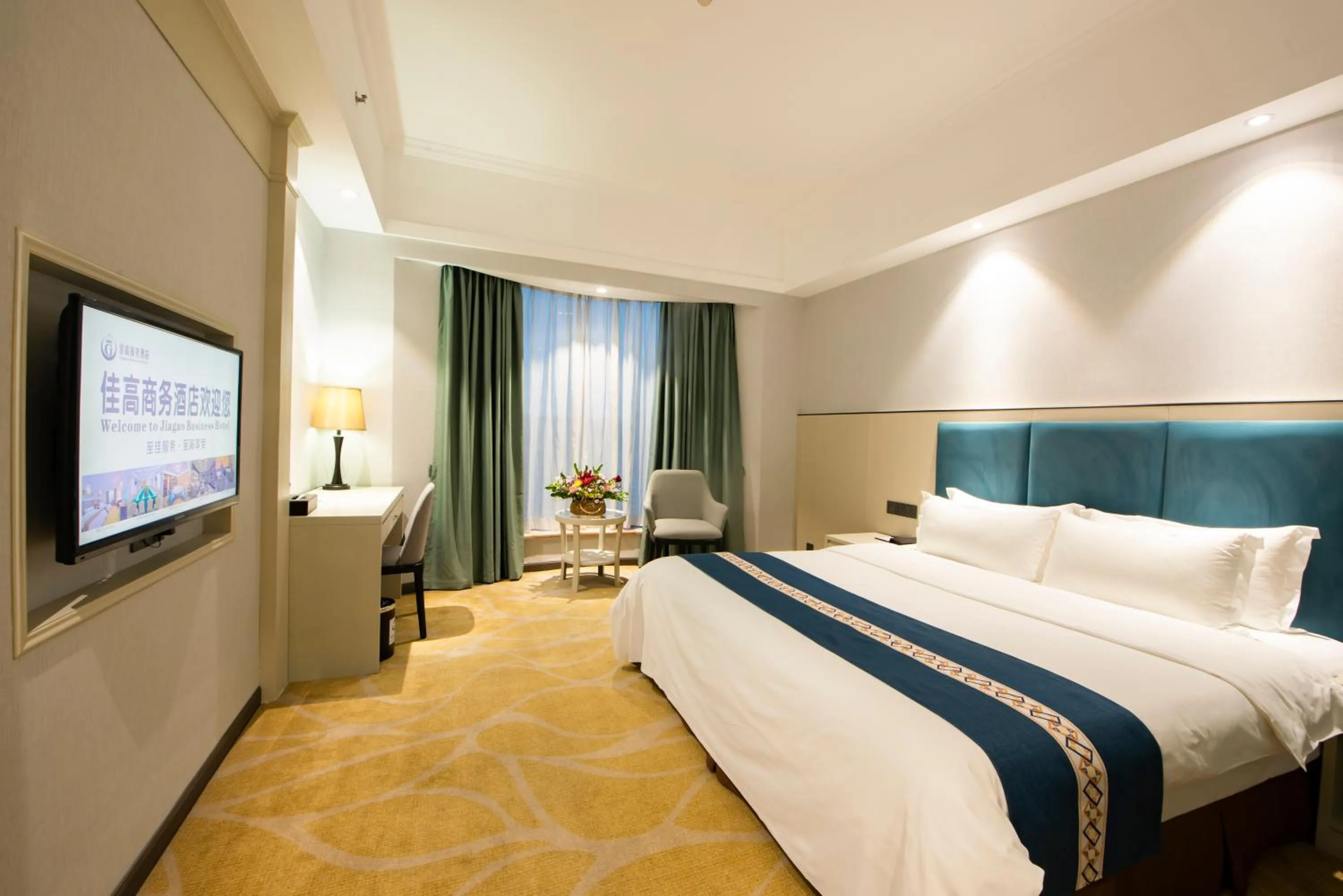 Bed in Foshan Jiagao Business Hotel