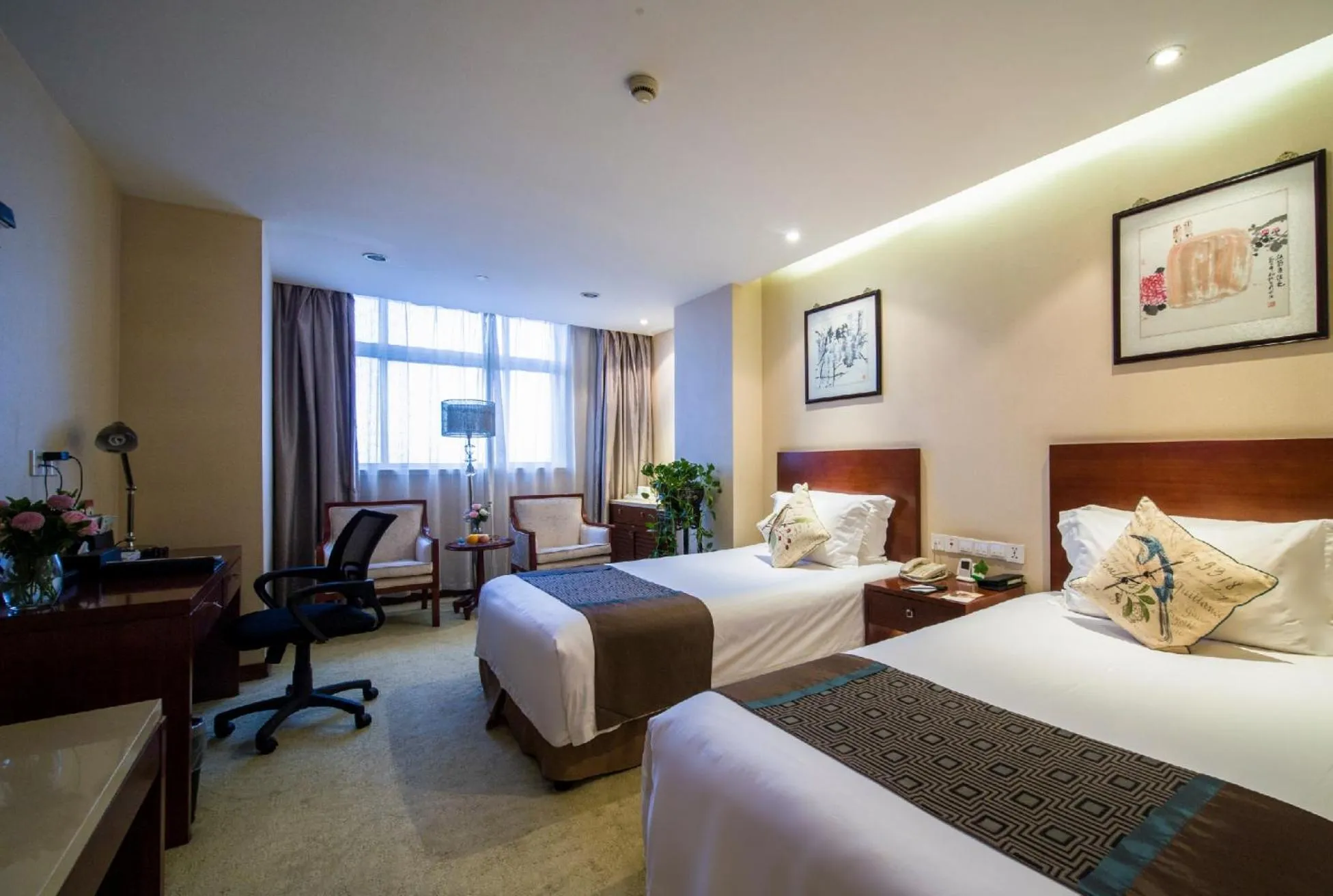 Bed in Landison Plaza International Hotel