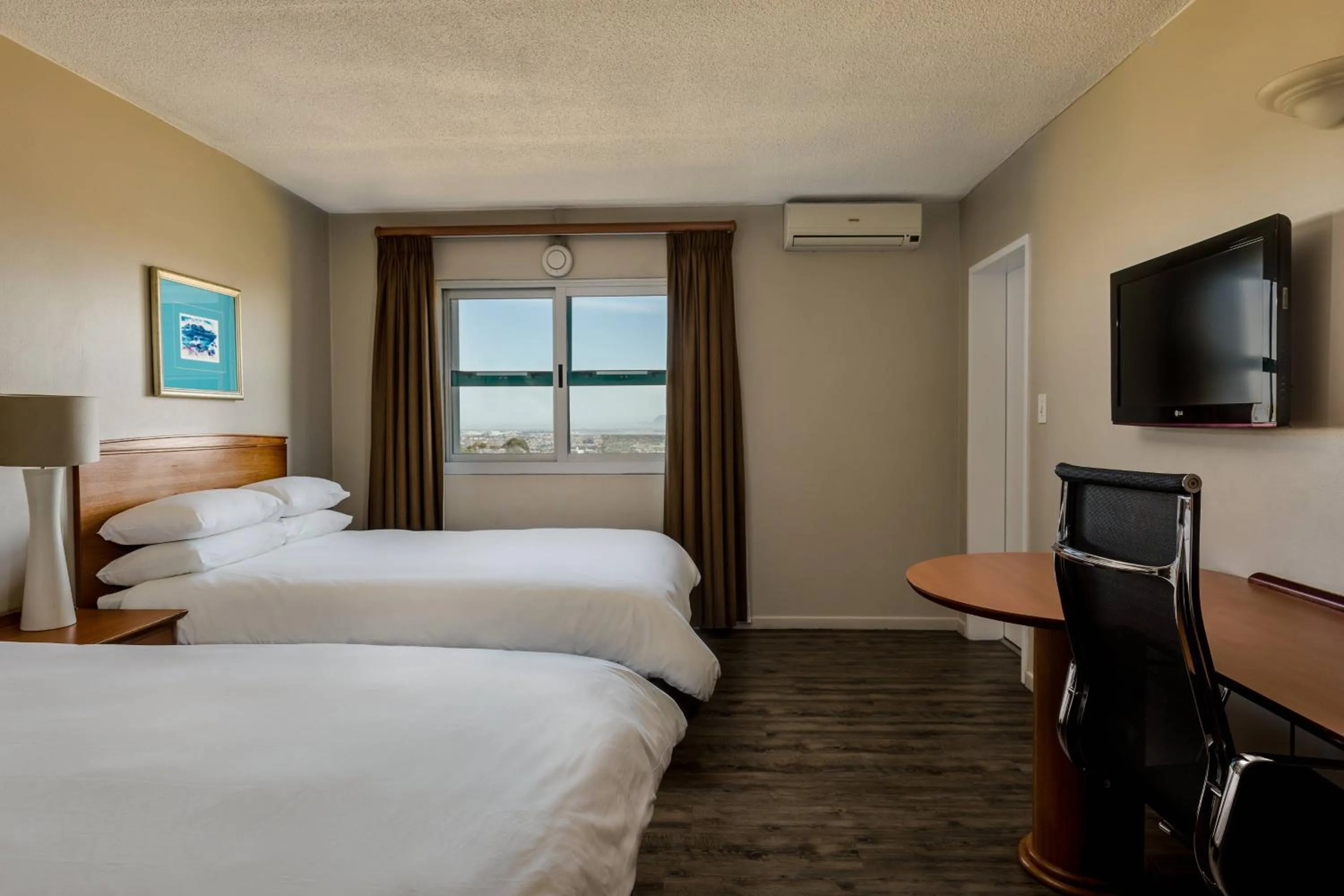 Photo of the whole room, Bed in Protea Hotel by Marriott Cape Town Tyger Valley