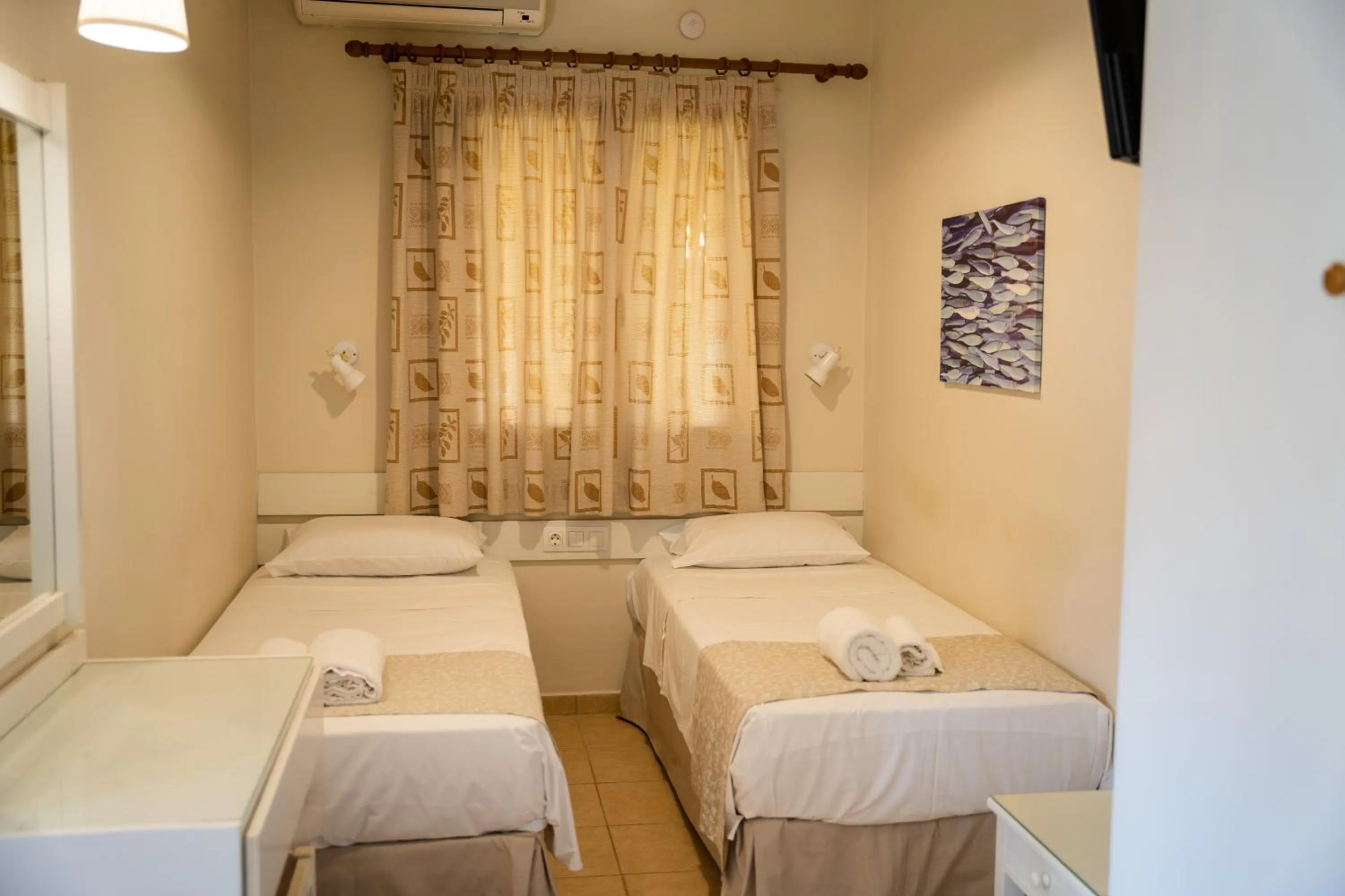 Bed in Blue Sky Apartments