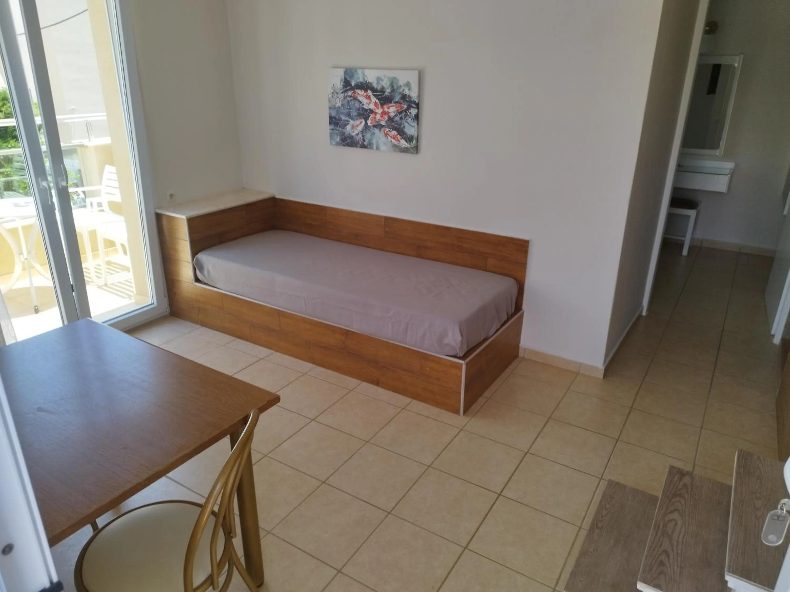 Bed in Blue Sky Apartments