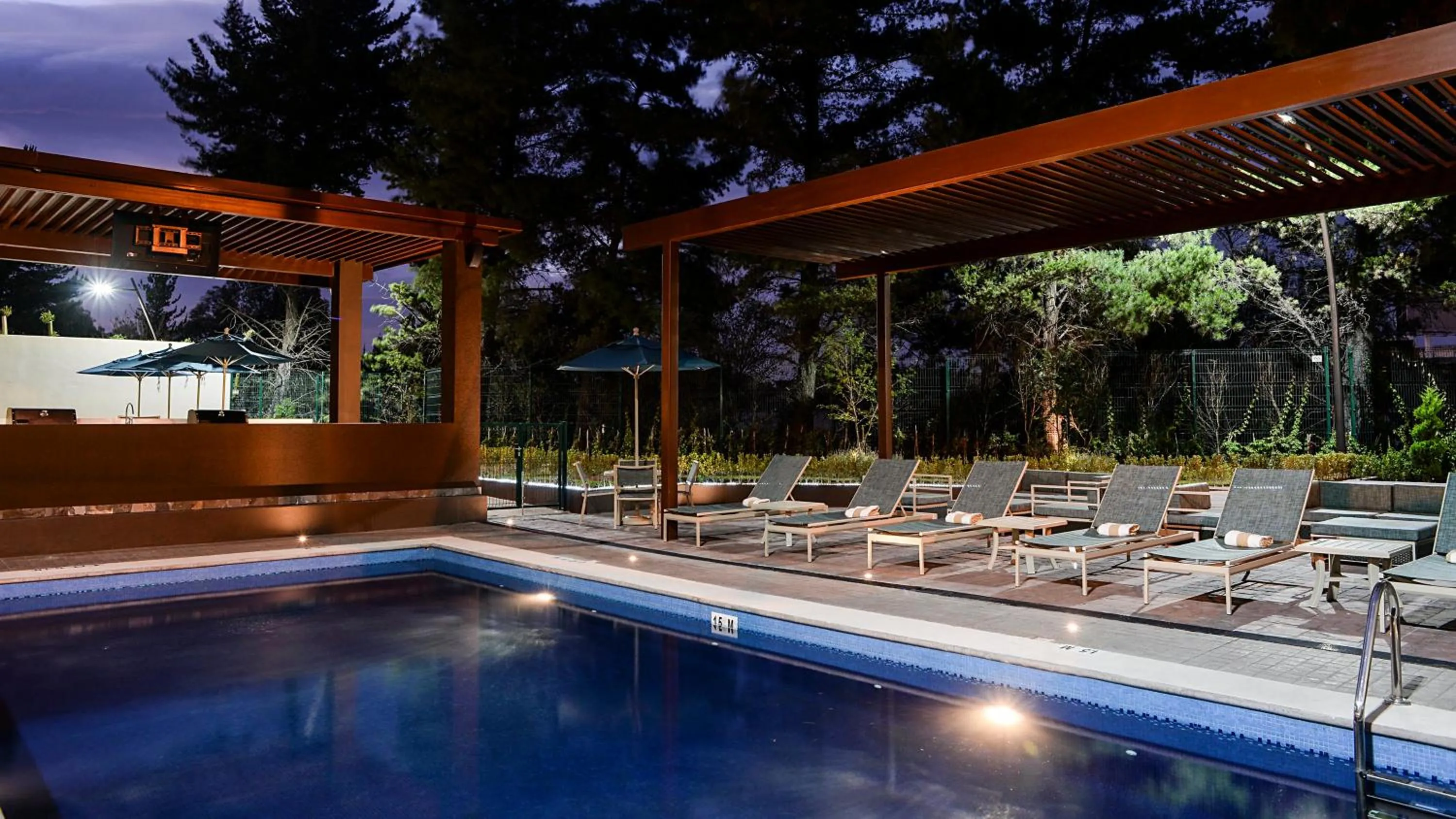 Swimming pool in Staybridge Suites Puebla by IHG