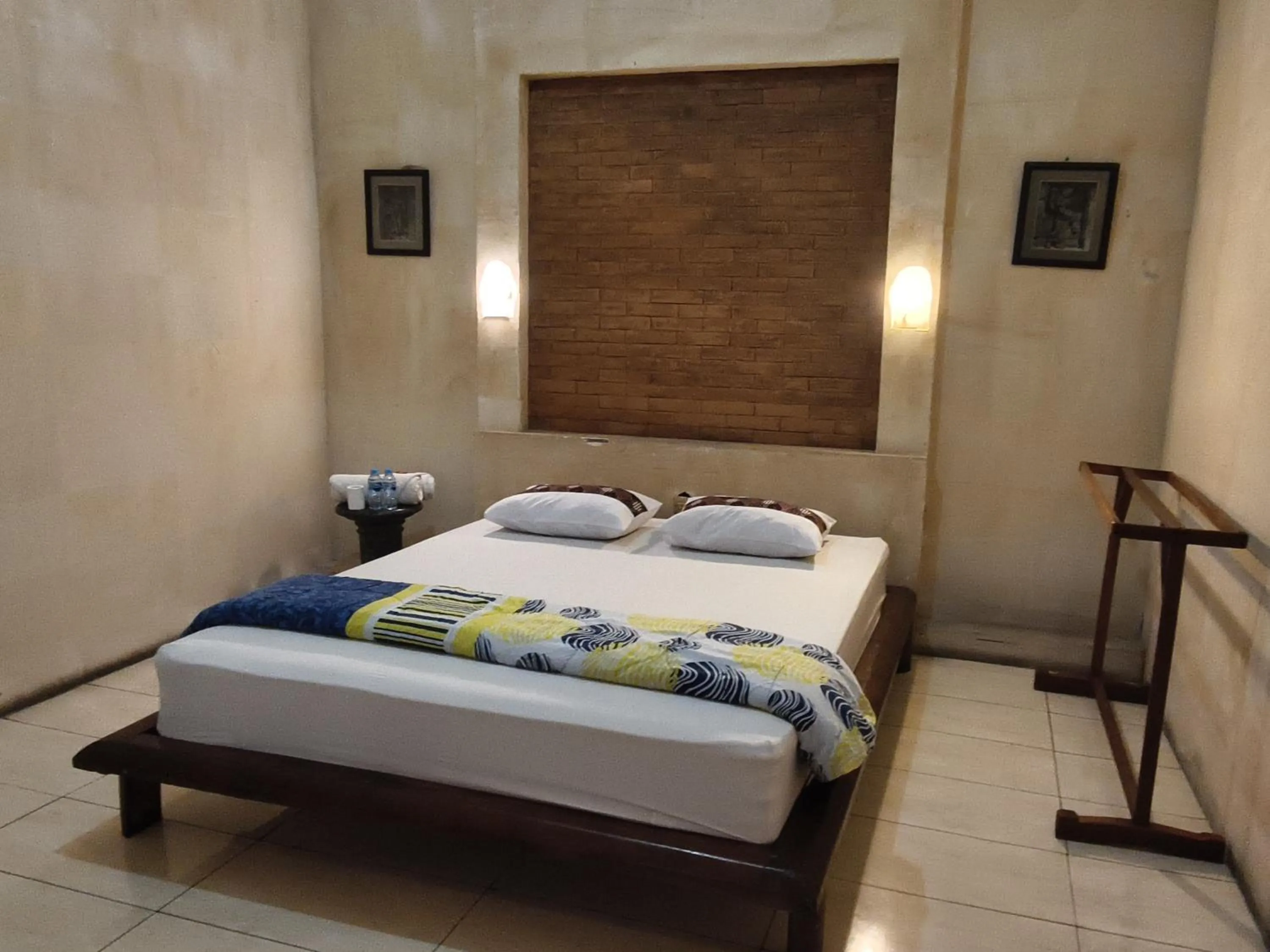 Bed in Lotus 2 Guest House