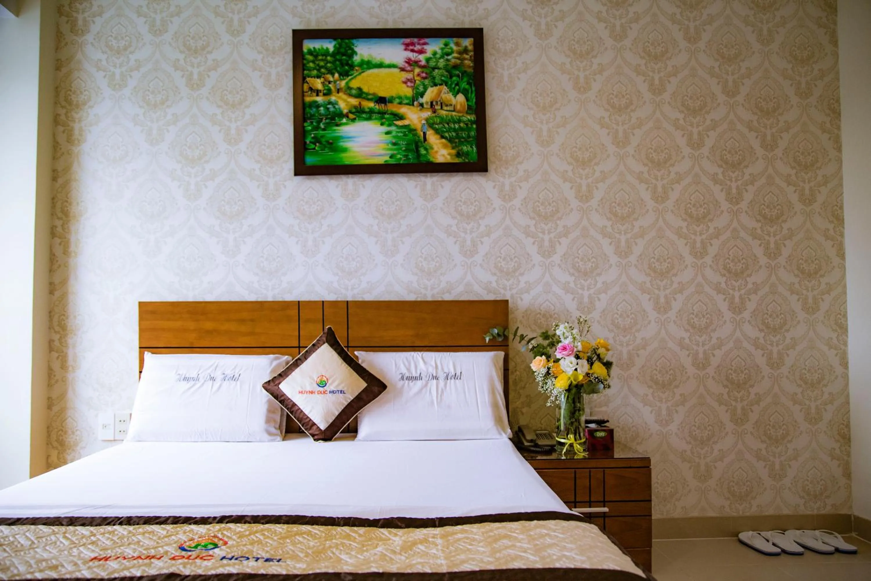 Bed in Huynh Duc Hotel