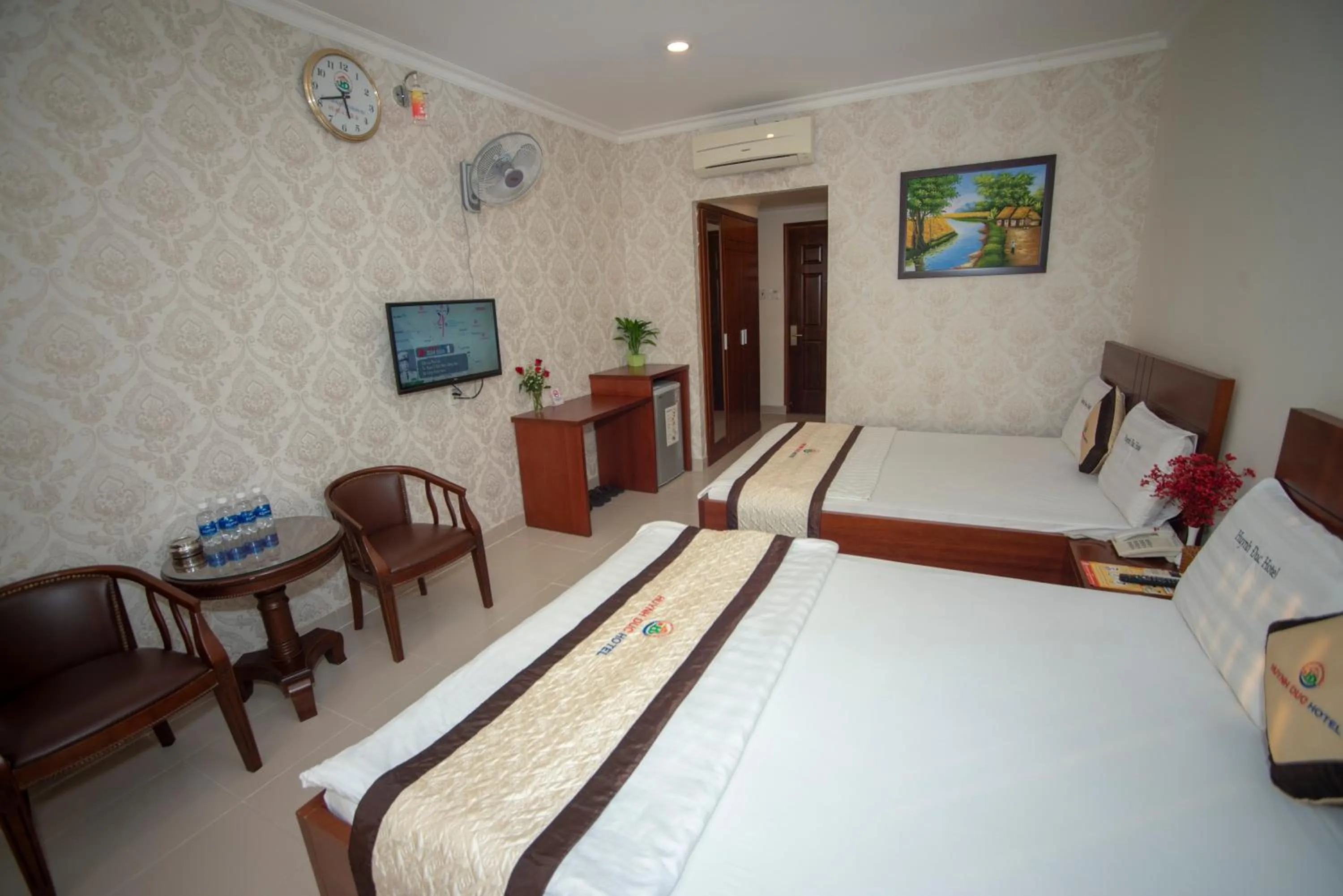 Bed in Huynh Duc Hotel
