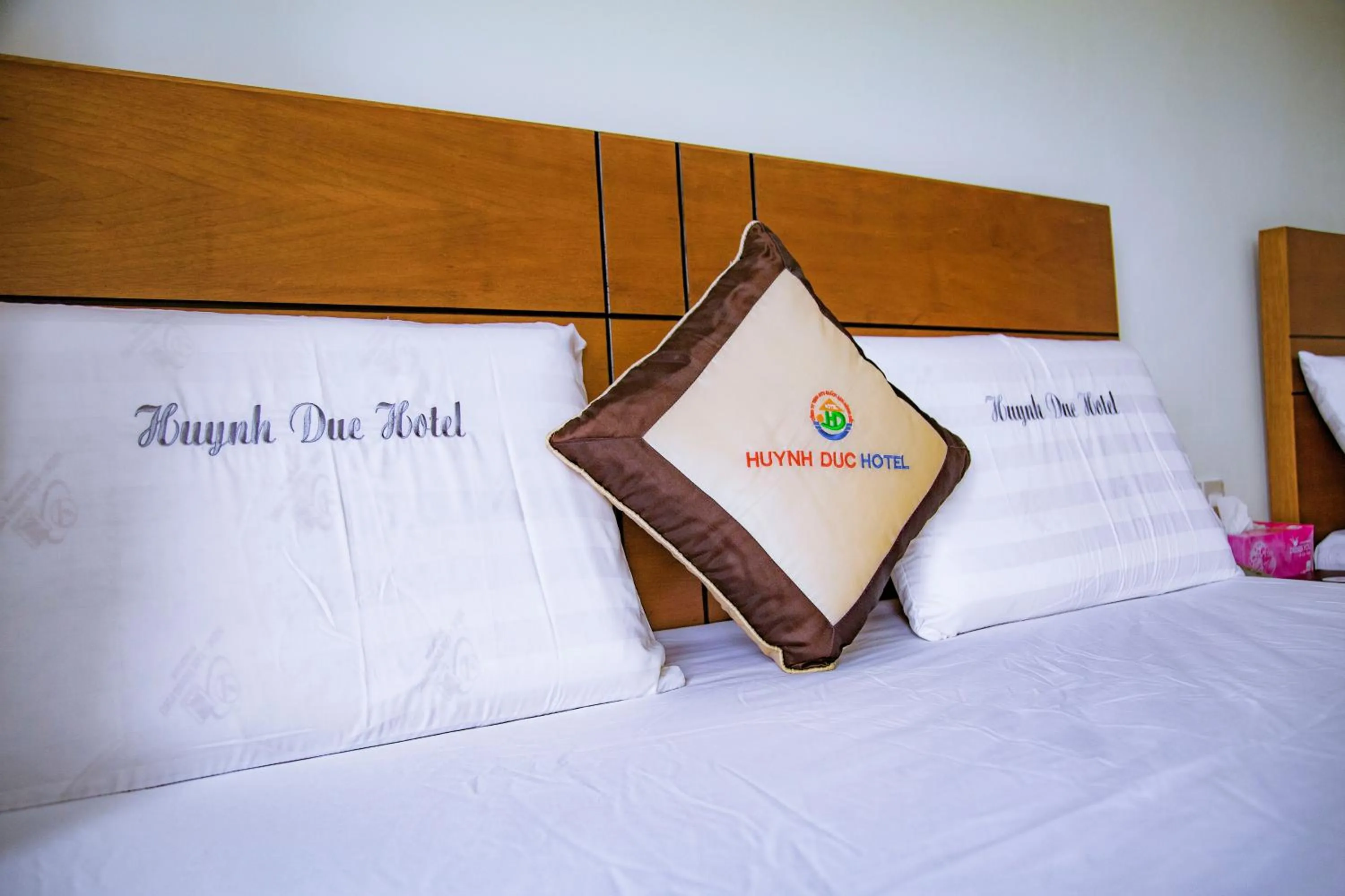 Bed in Huynh Duc Hotel