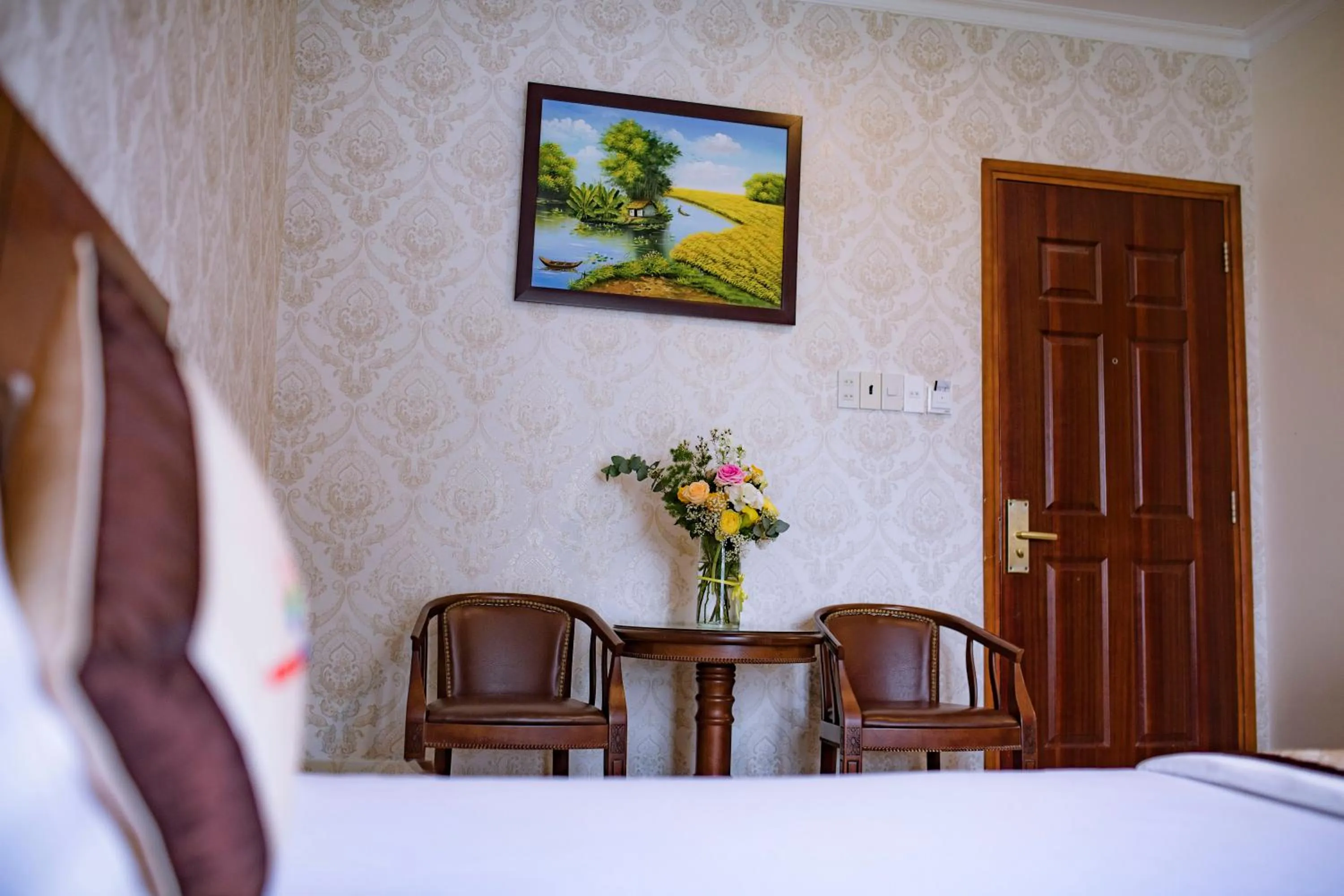 Bed in Huynh Duc Hotel