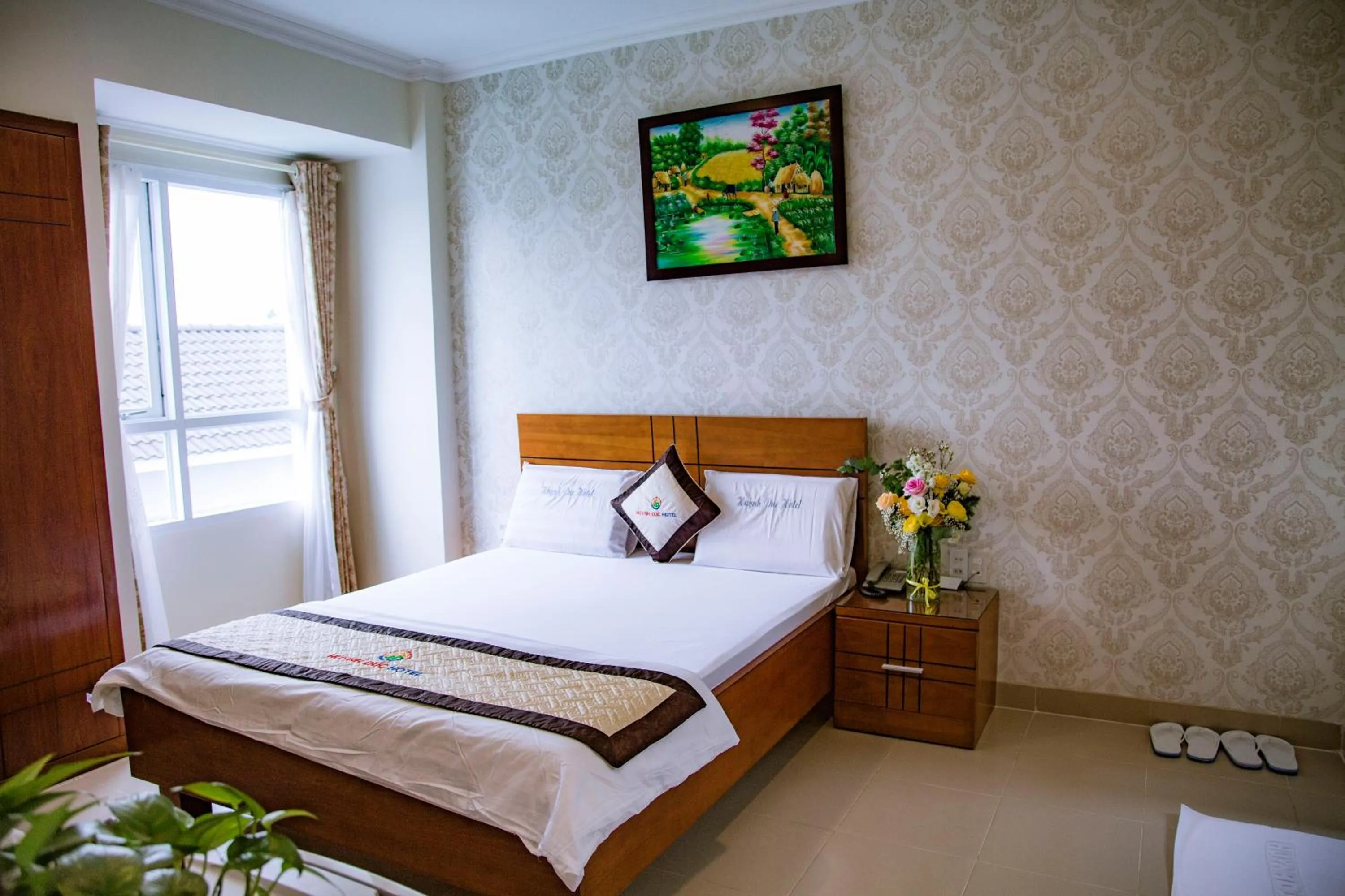 Bed in Huynh Duc Hotel