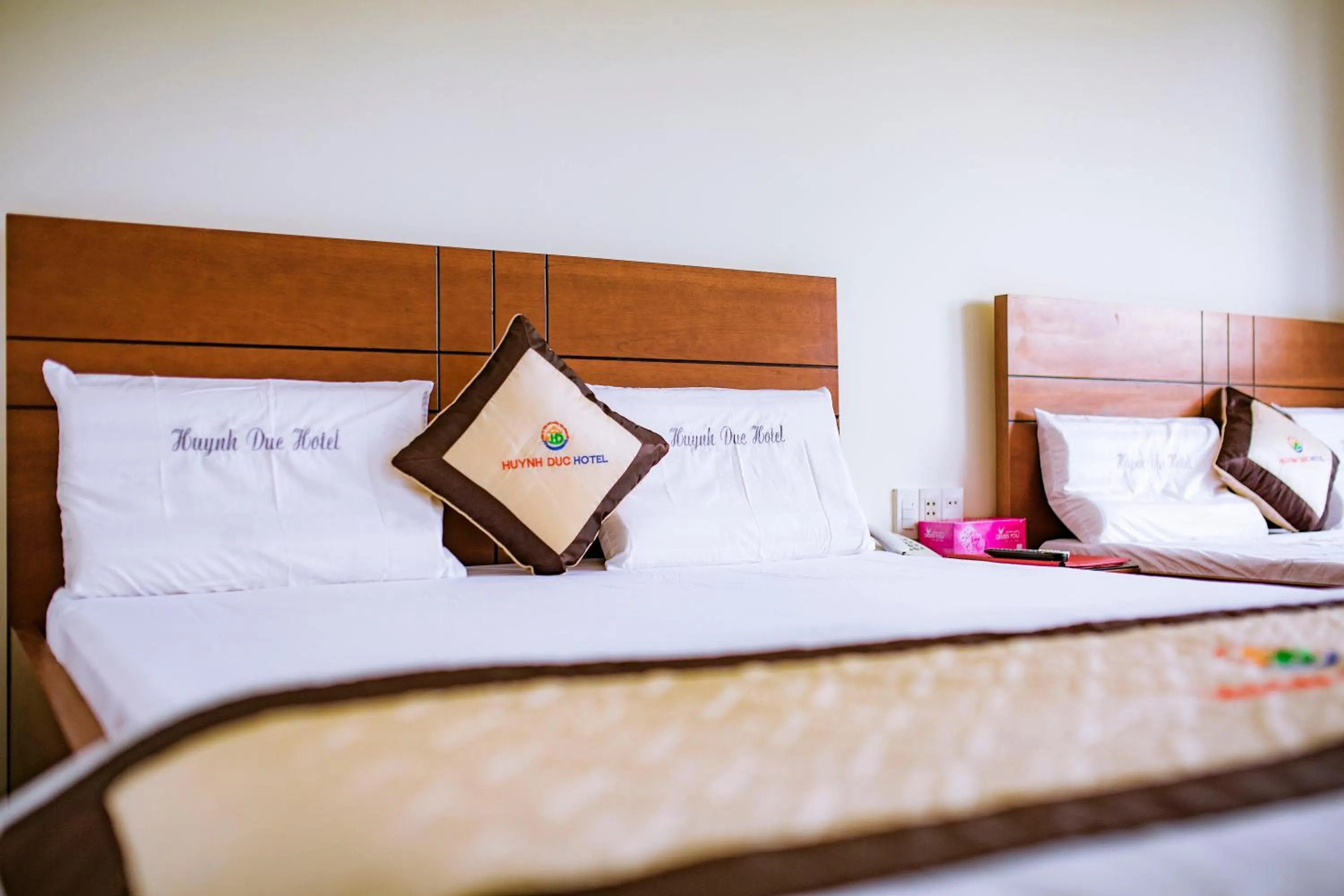 Bed in Huynh Duc Hotel