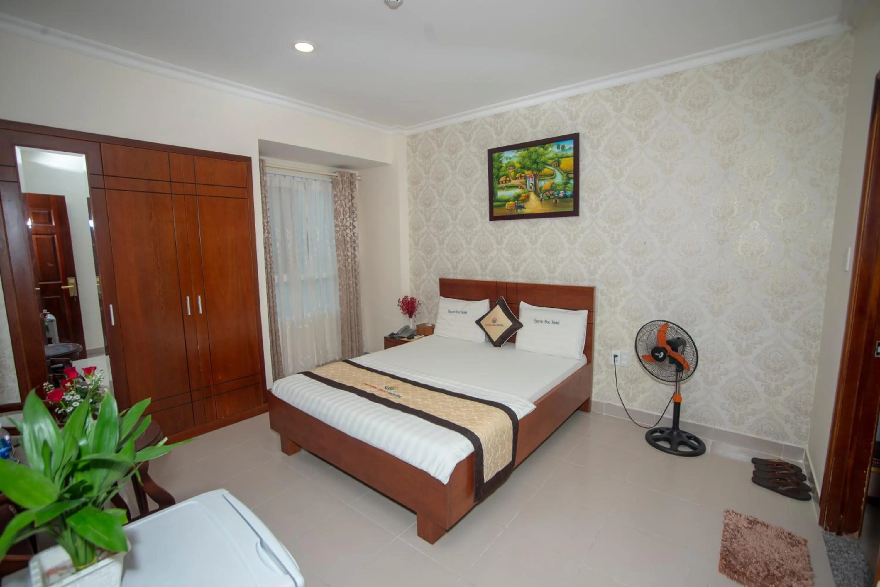 Bed in Huynh Duc Hotel