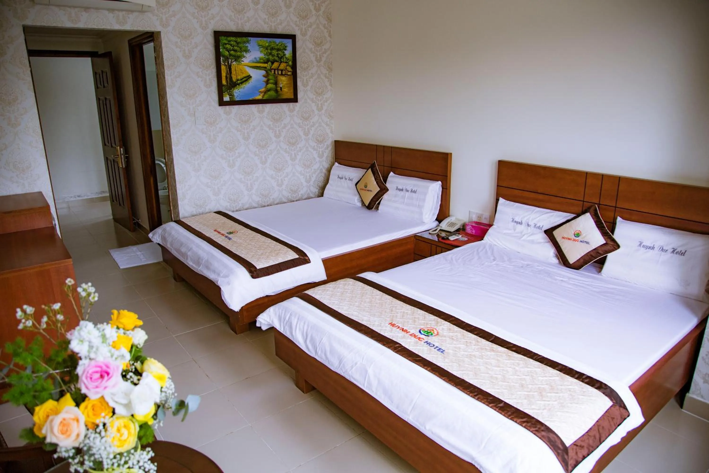 Bed in Huynh Duc Hotel