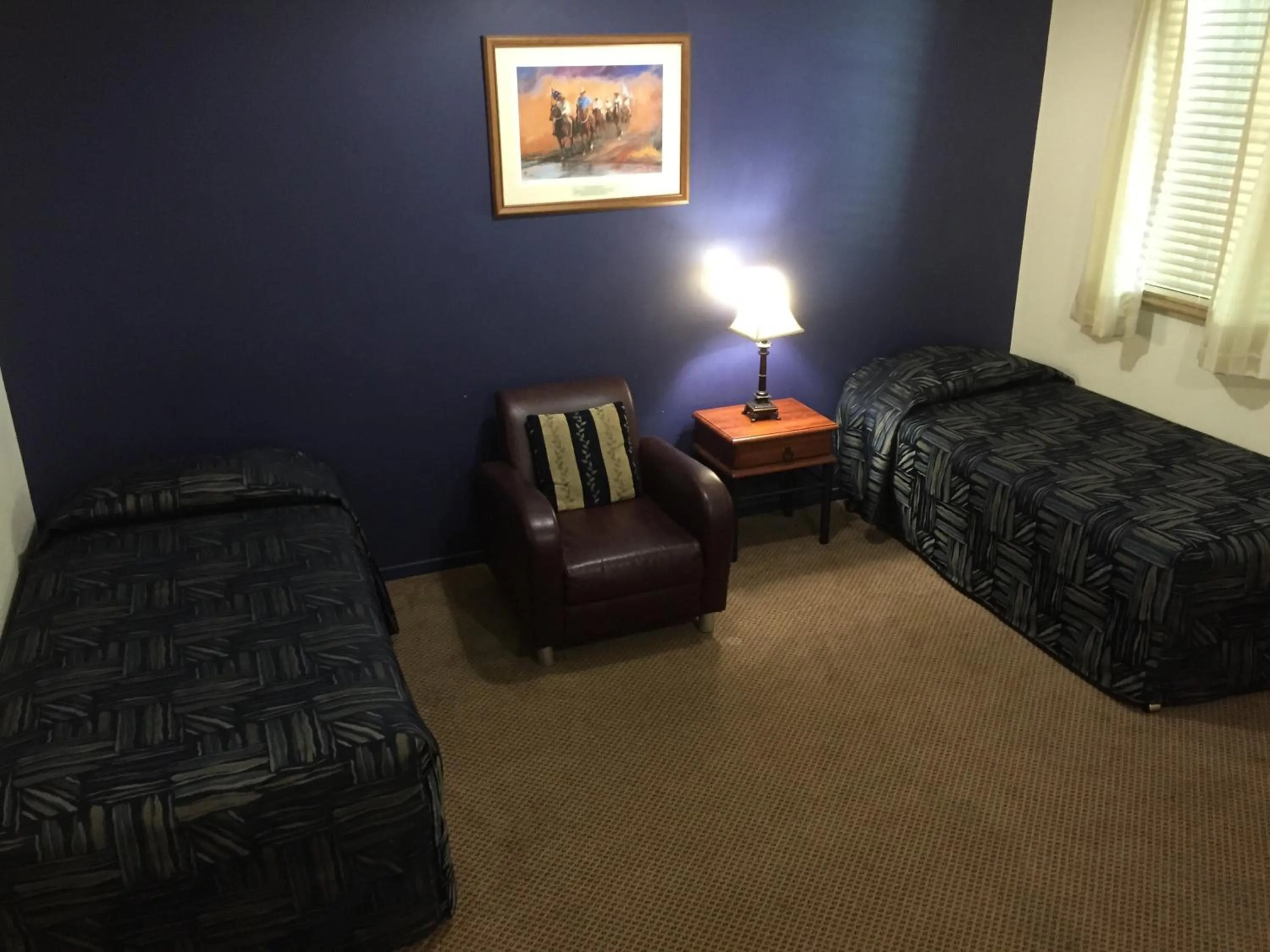 Bed in Criterion Hotel-Motel Rockhampton