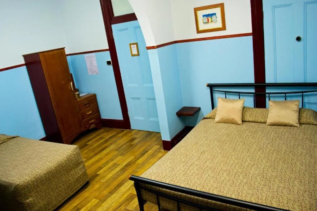 Bed in Criterion Hotel-Motel Rockhampton
