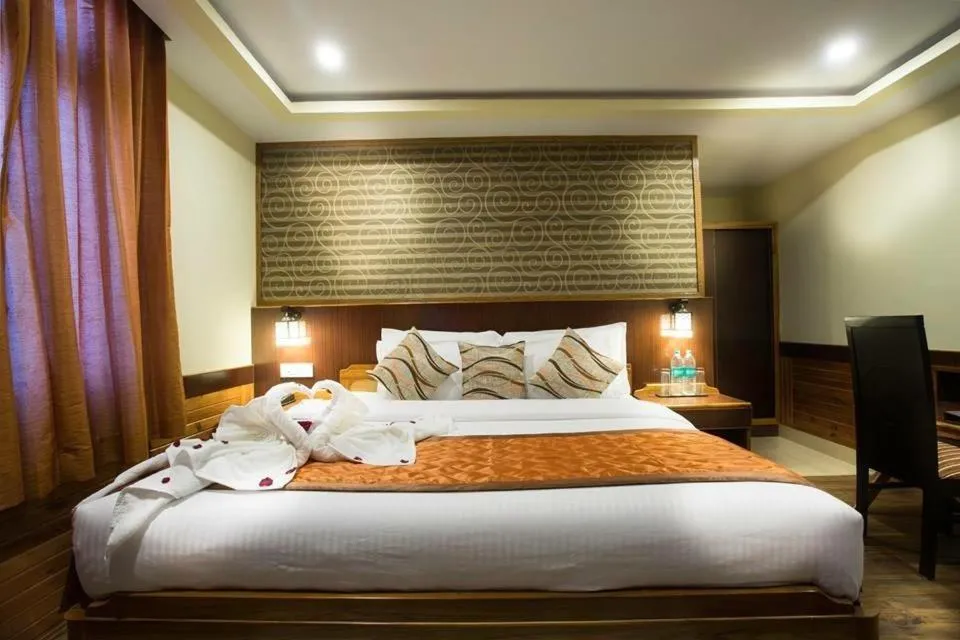 Bed in New Orchid Lords Inn Gangtok
