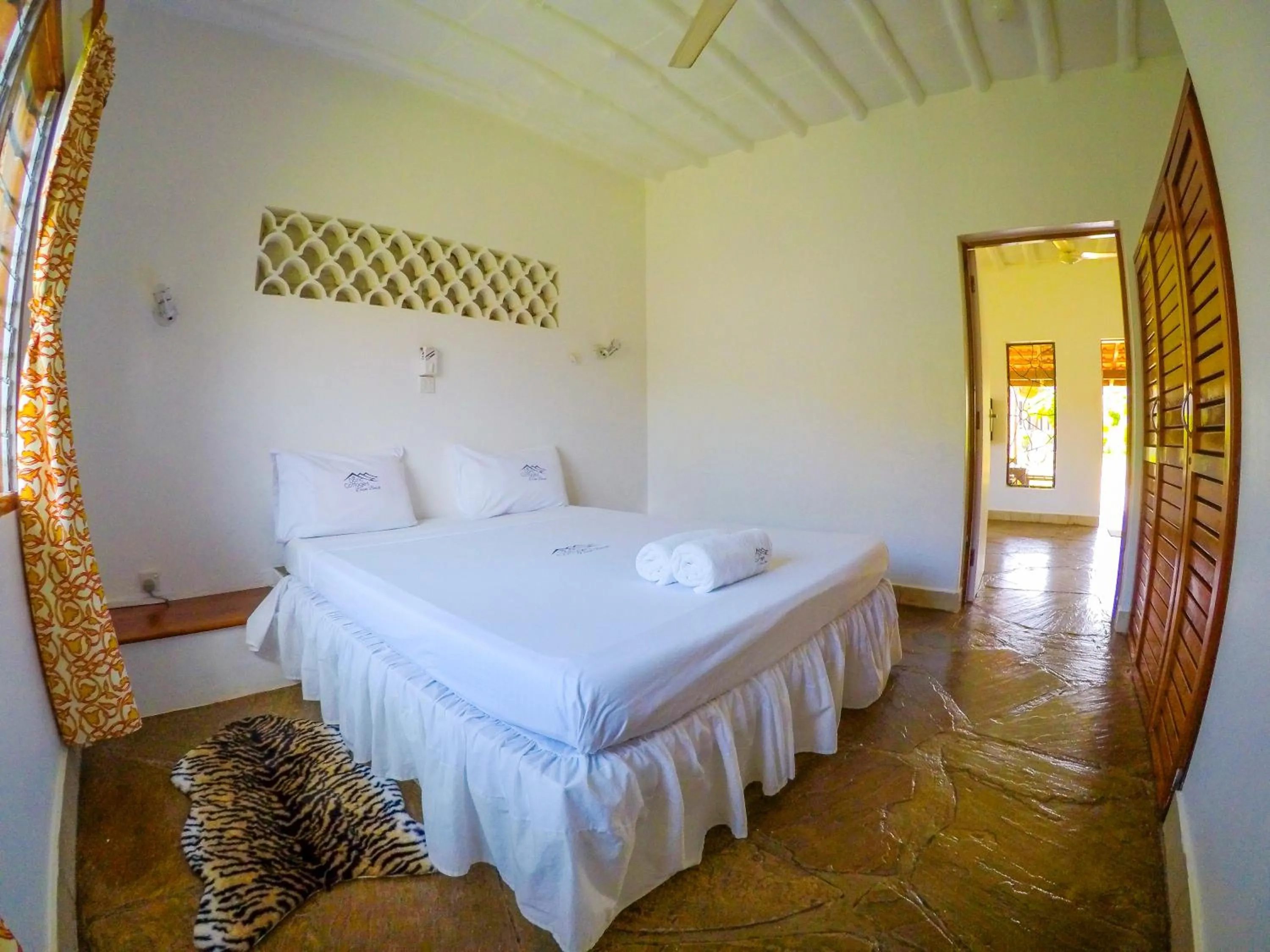 Bed in Doric Cottages Diani