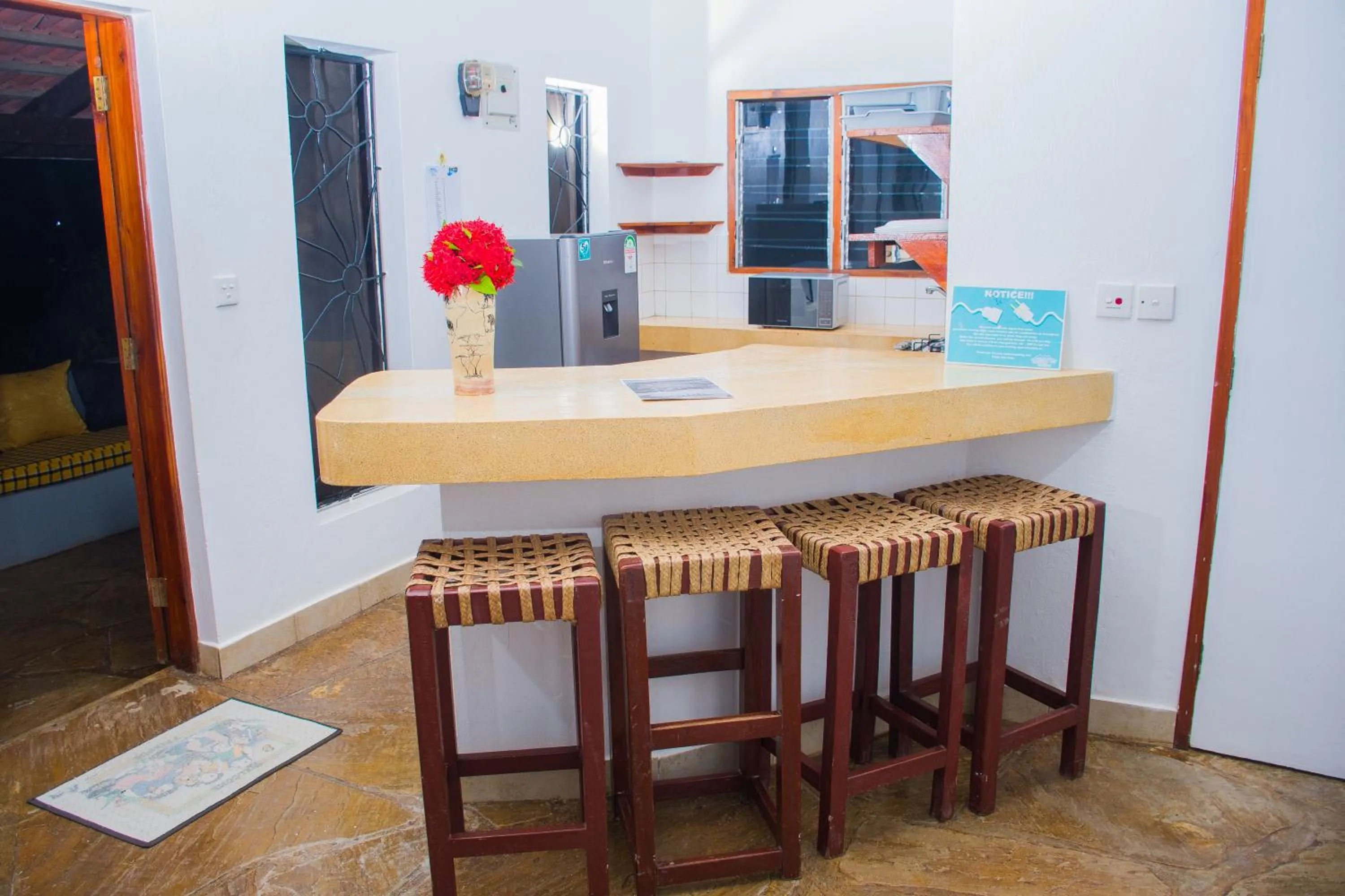 Kitchen or kitchenette in Doric Cottages Diani