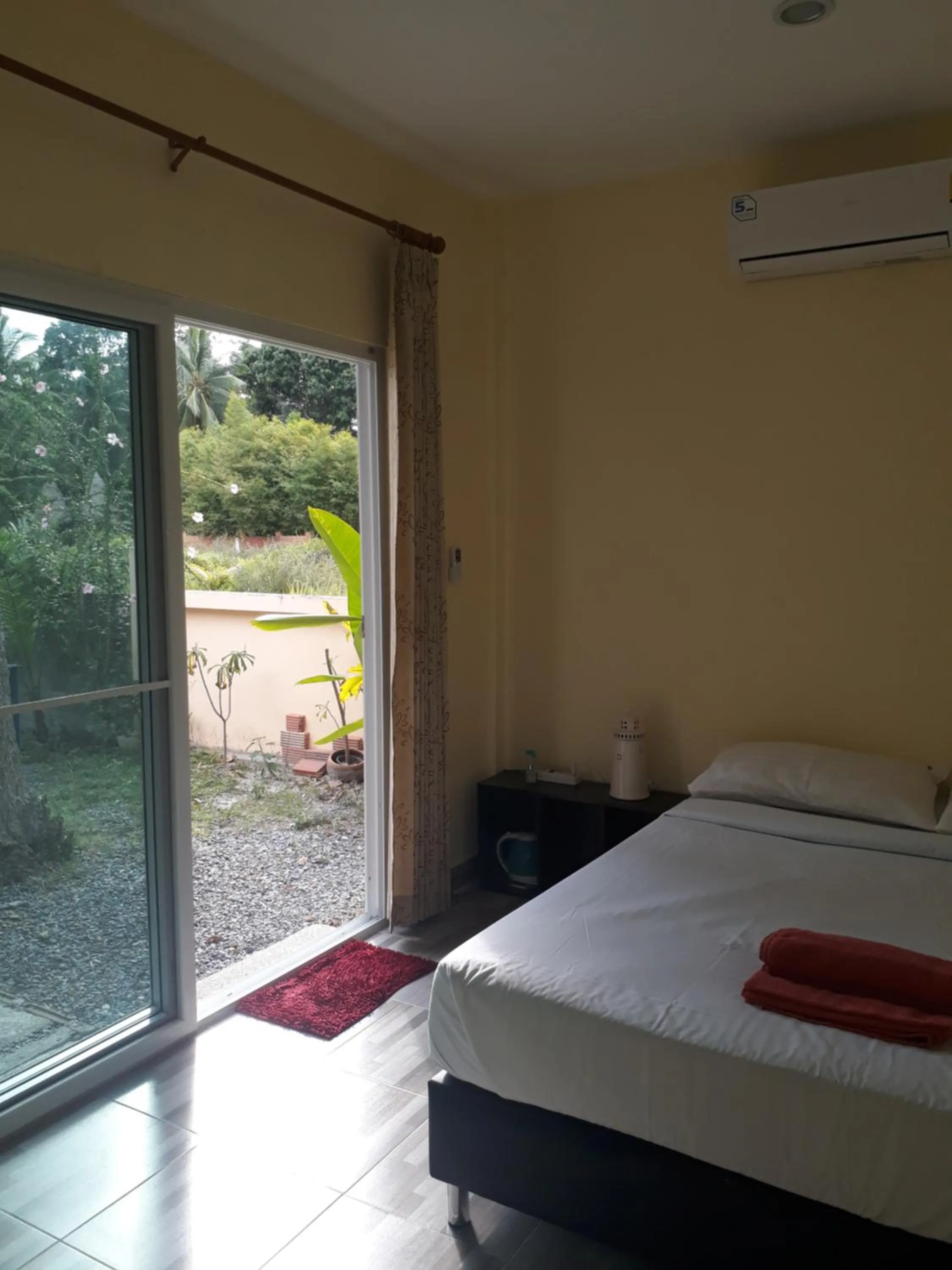 Bed in Khanom Garden Suite